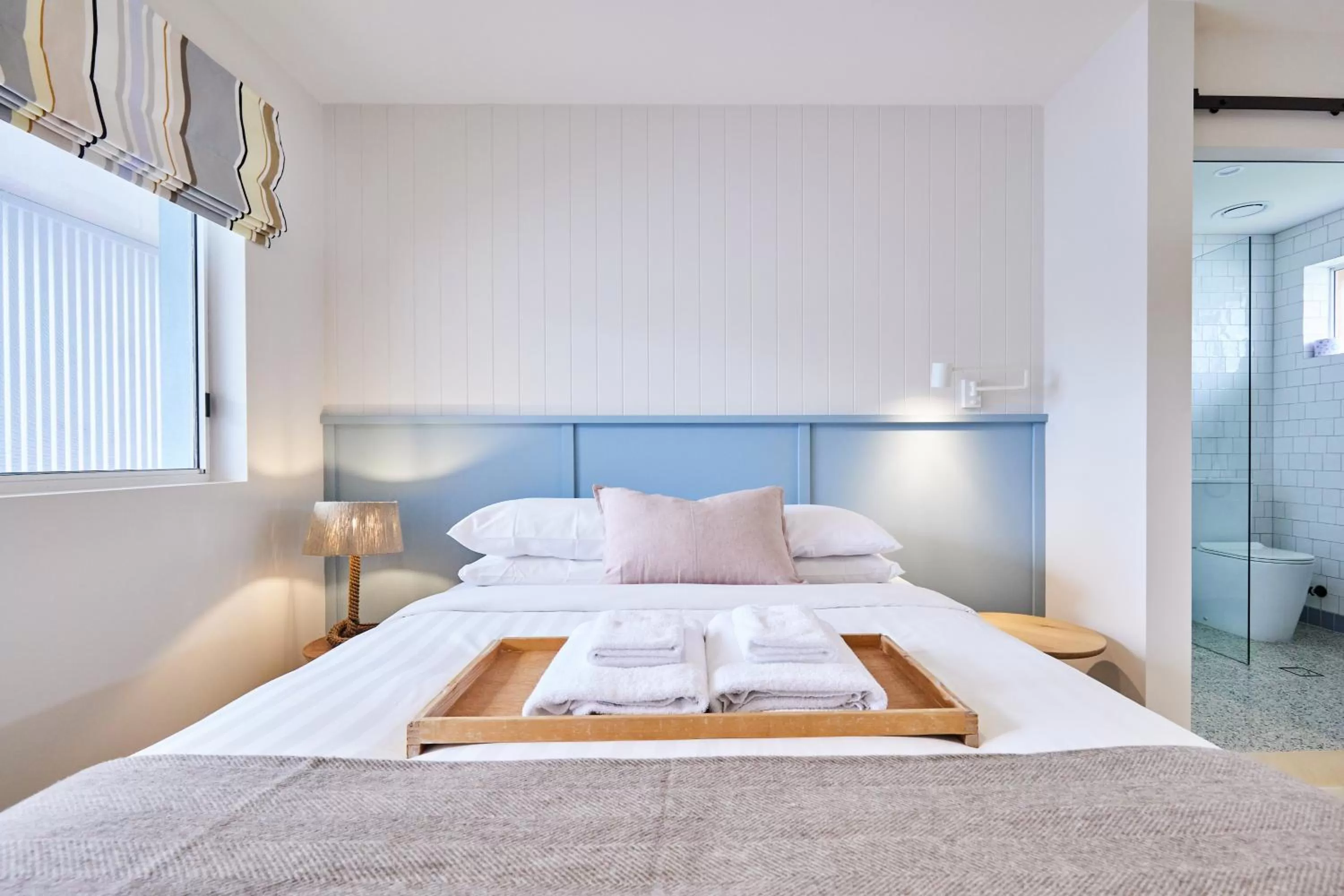 Bed in The Blue Water Motel