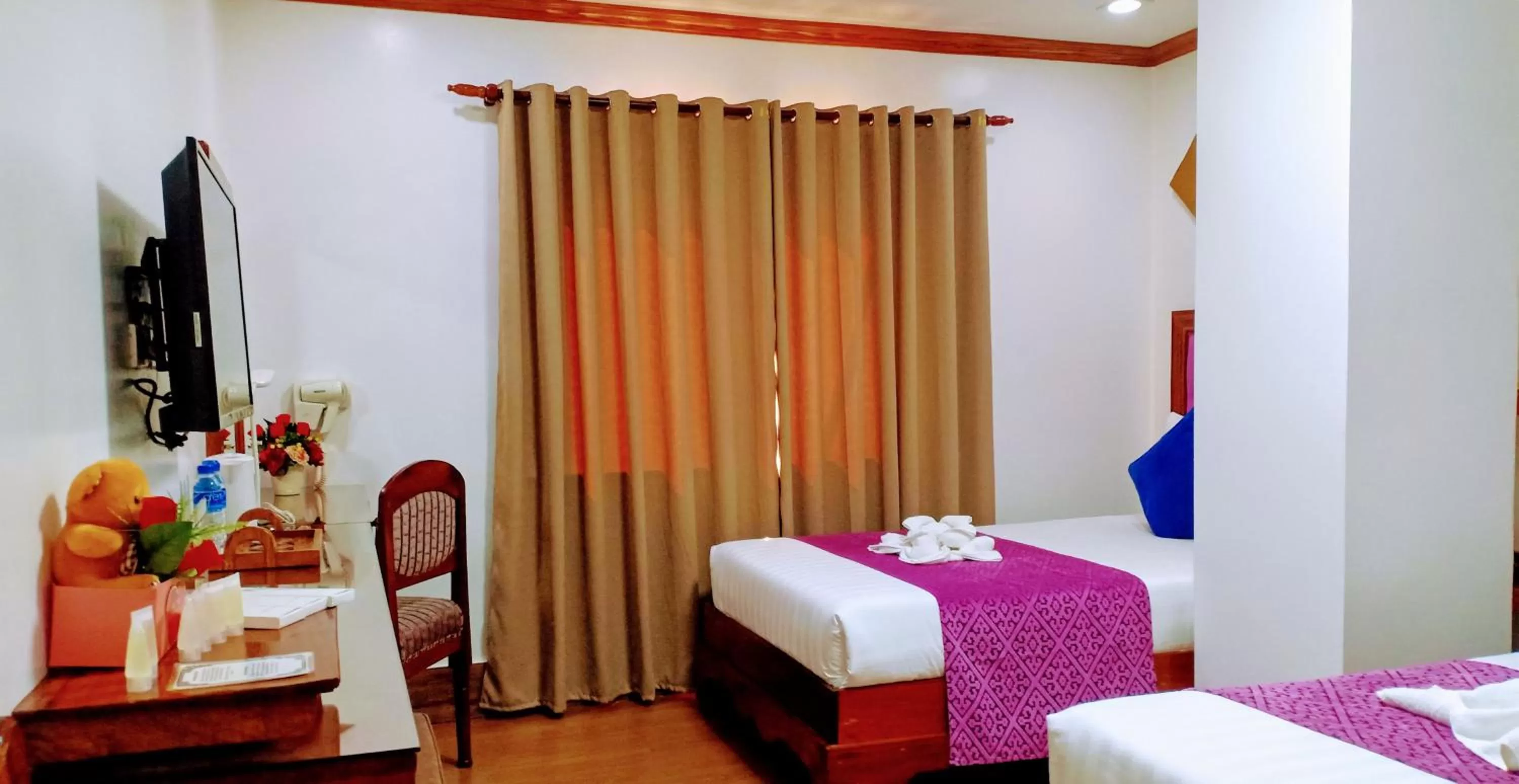 Bed in CLN Boutique Hotel