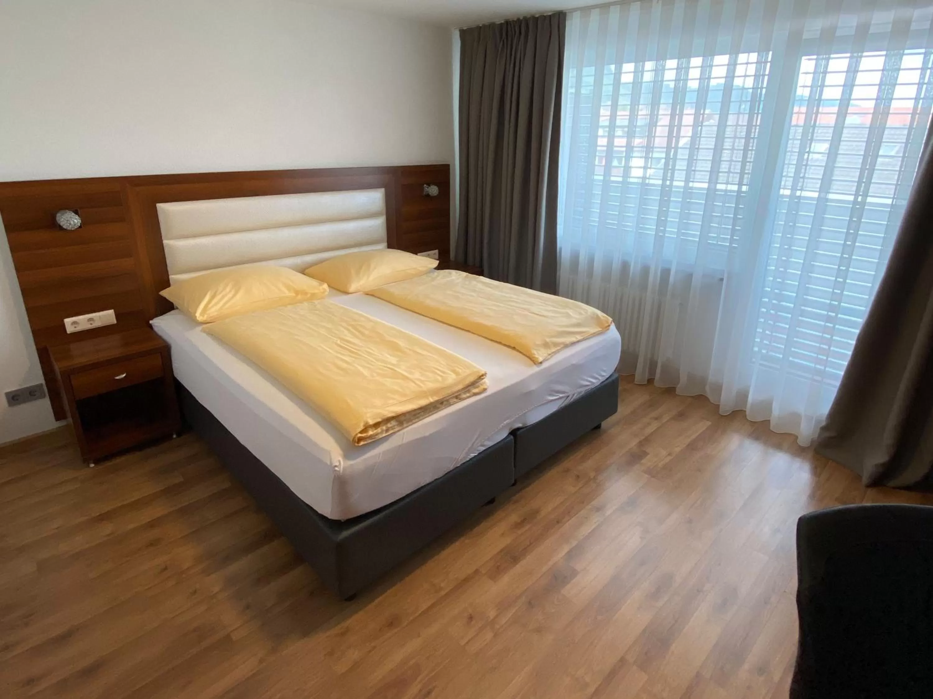 Bed in ZUM ZIEL Hotel Grenzach-Wyhlen bei Basel