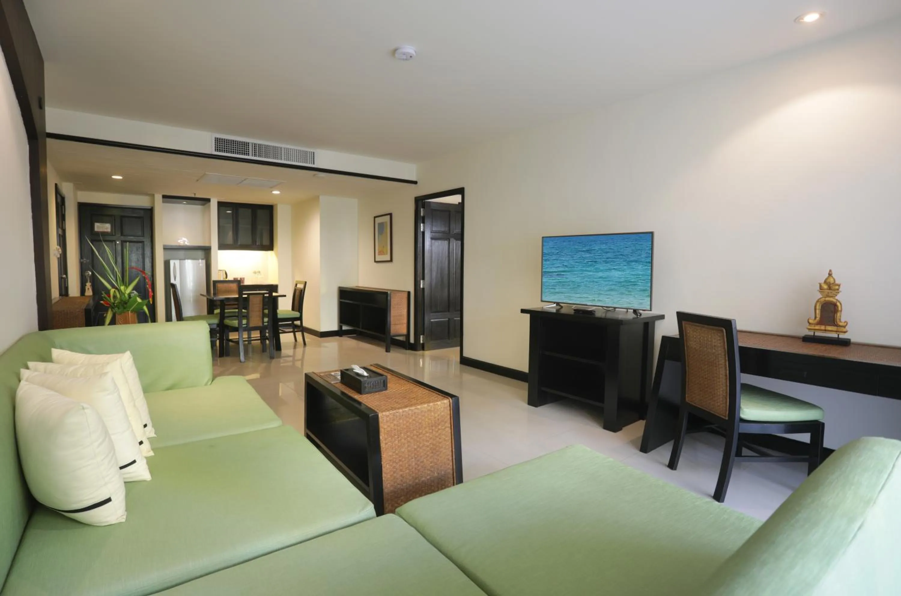 Living room in Woraburi Phuket Resort & Spa - SHA Plus