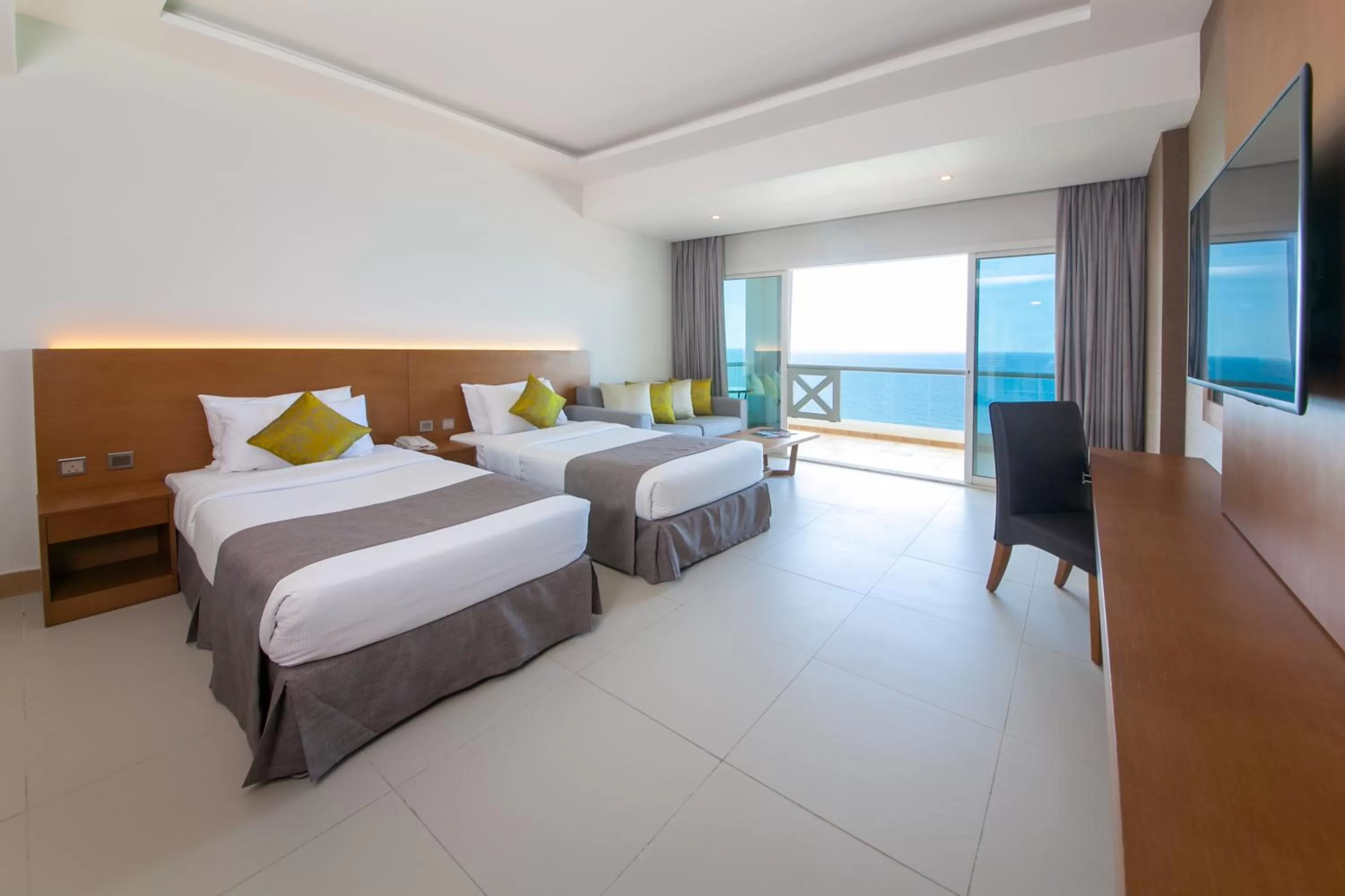 Balcony/Terrace, Bed in Ramada by Wyndham Beach Hotel Ajman