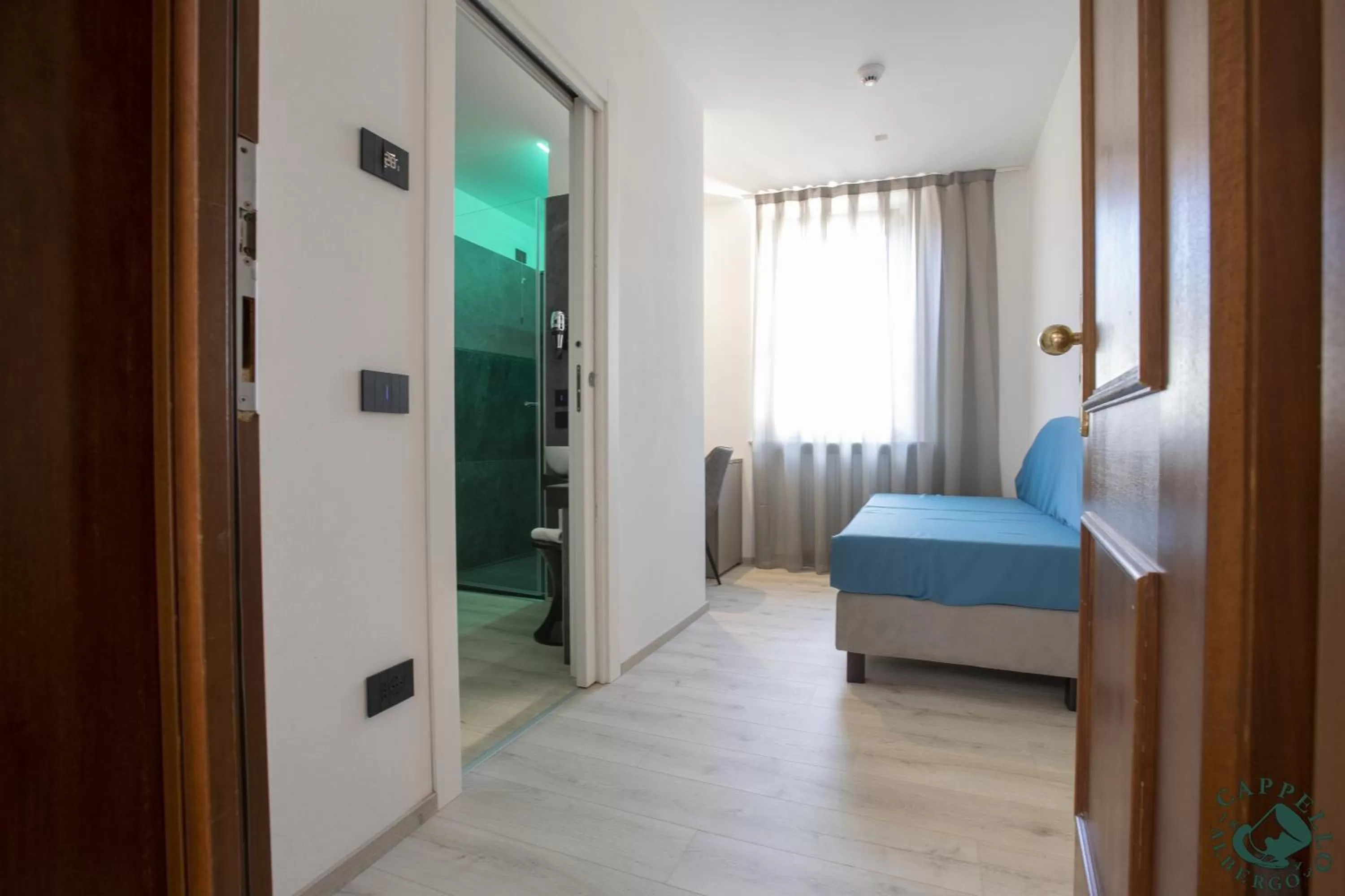 Bed in Albergo Cappello e Cadore