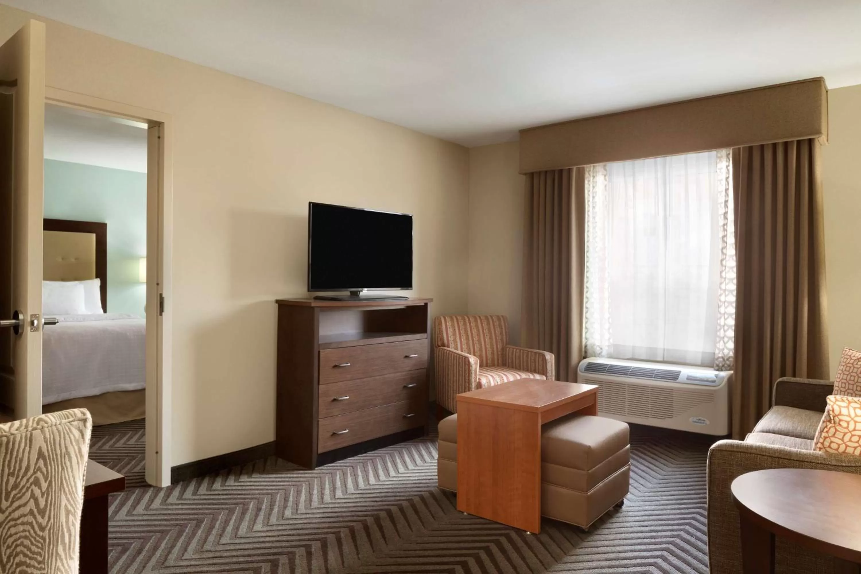 Bed in Homewood Suites by Hilton Kalamazoo-Portage