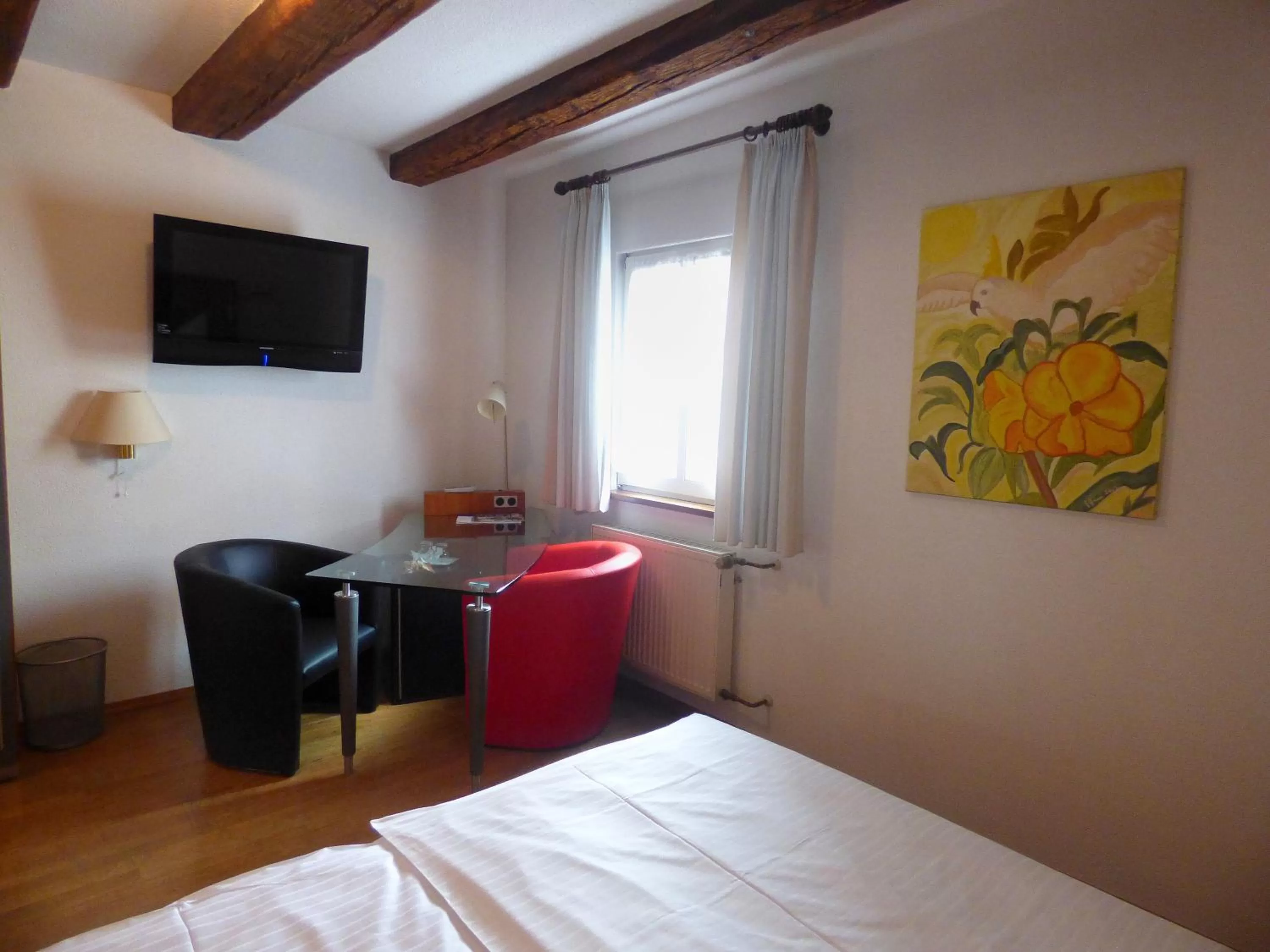 Seating area, Bed in Hotel Krone