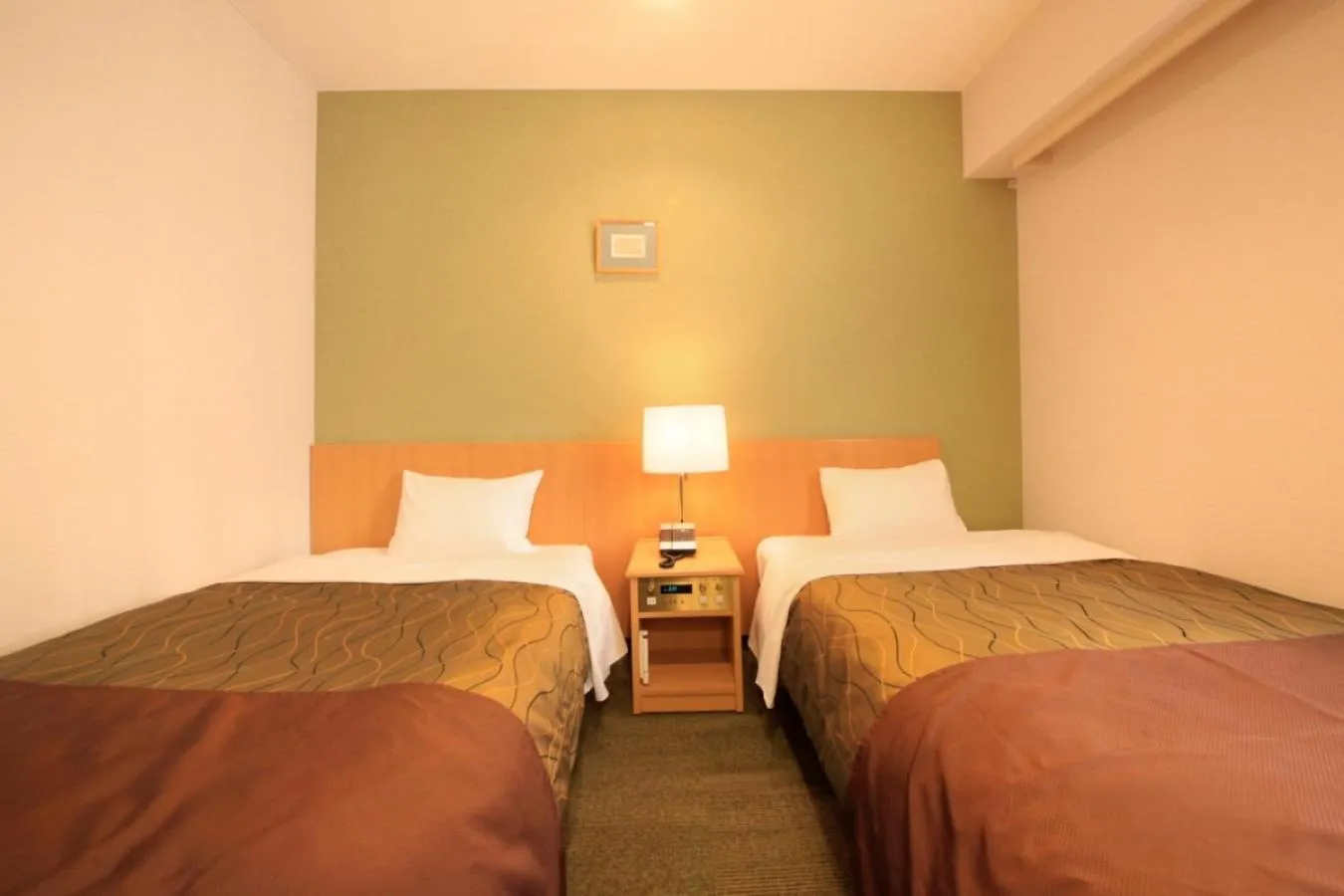 Bed in Hotel Grand City