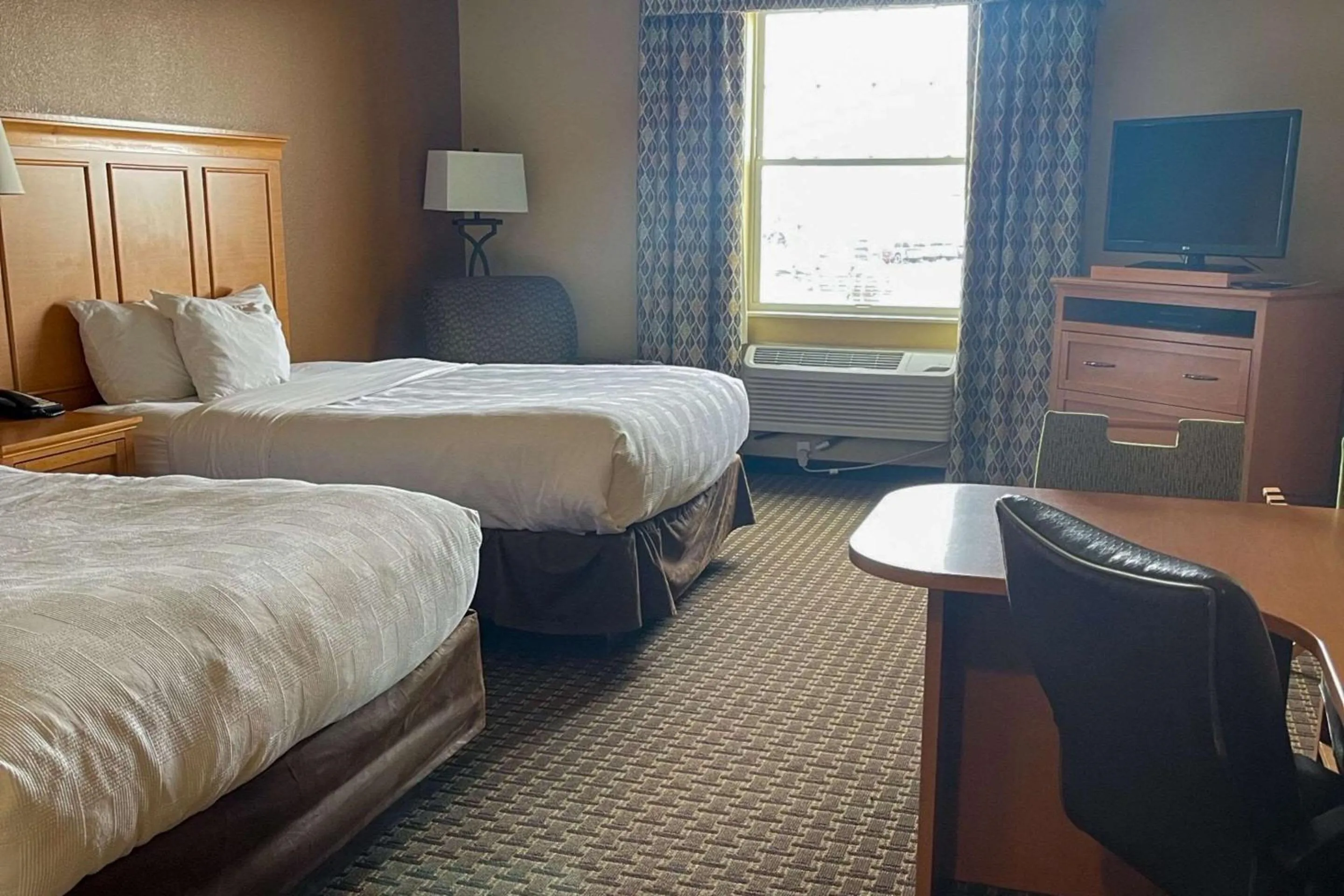 Bedroom, Bed in MainStay Suites Williston