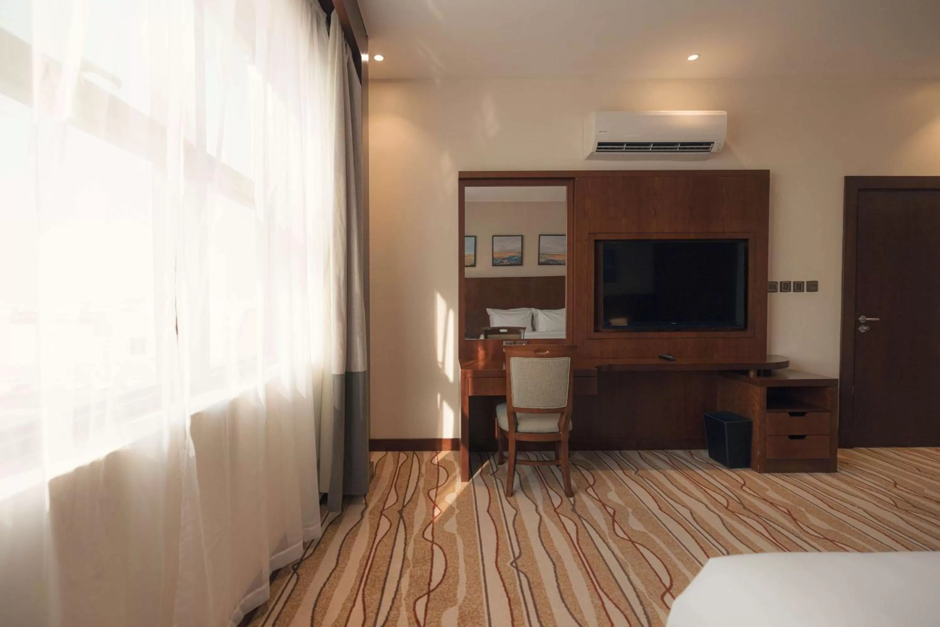 Photo of the whole room, Bed in Radisson Blu Hotel, Buraidah