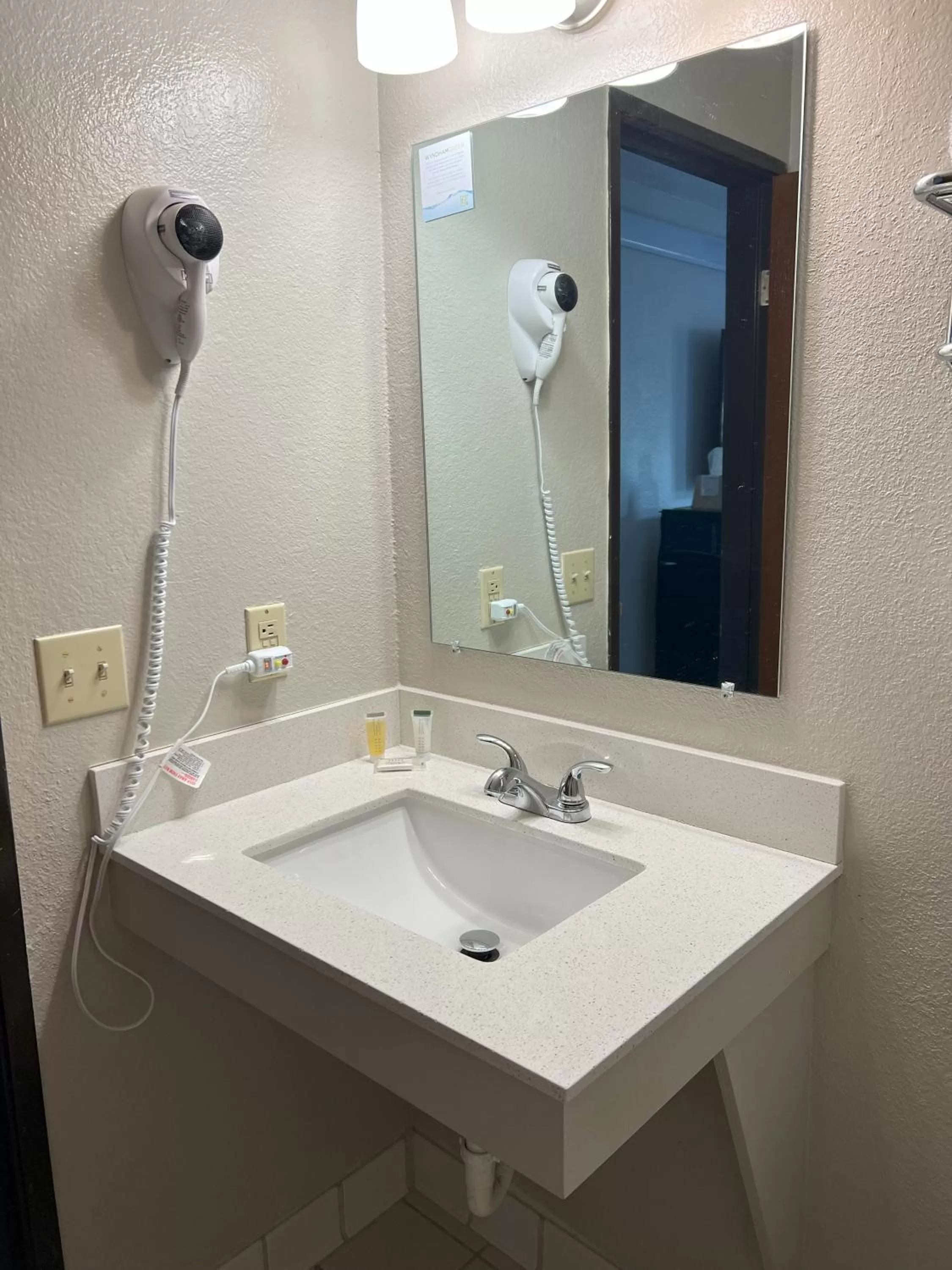 Bathroom in Days Inn by Wyndham Orange Park/Jacksonville