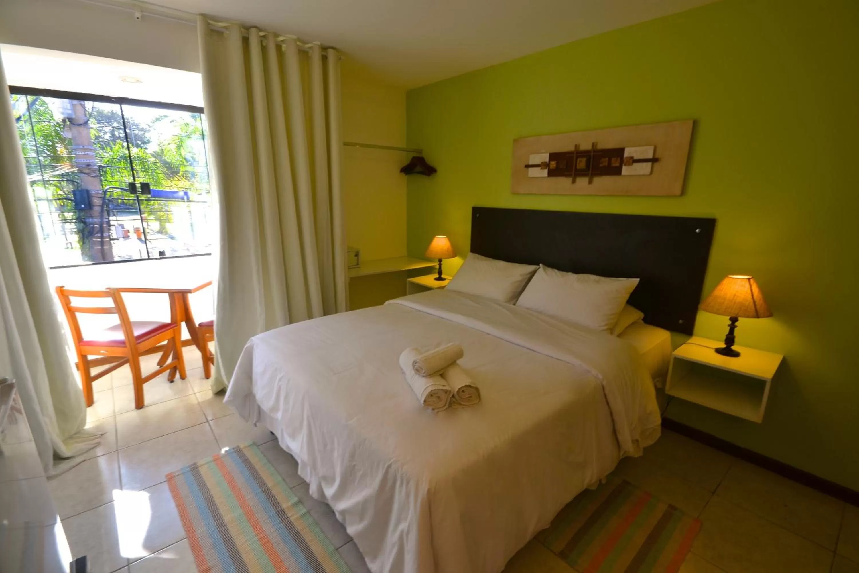 View (from property/room), Bed in Pousada do Centro Búzios