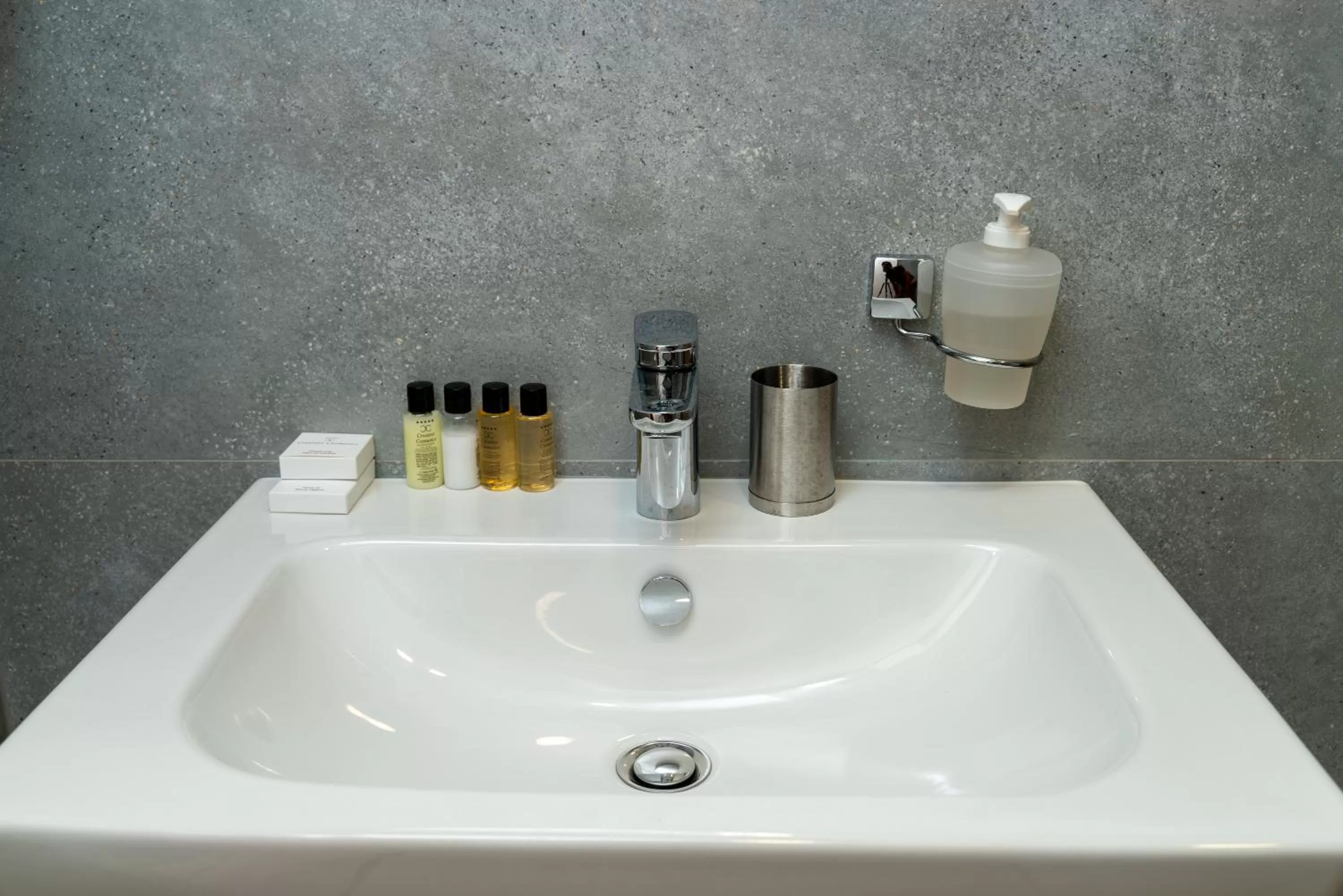 Bathroom in Ornament Hotel and Apartments