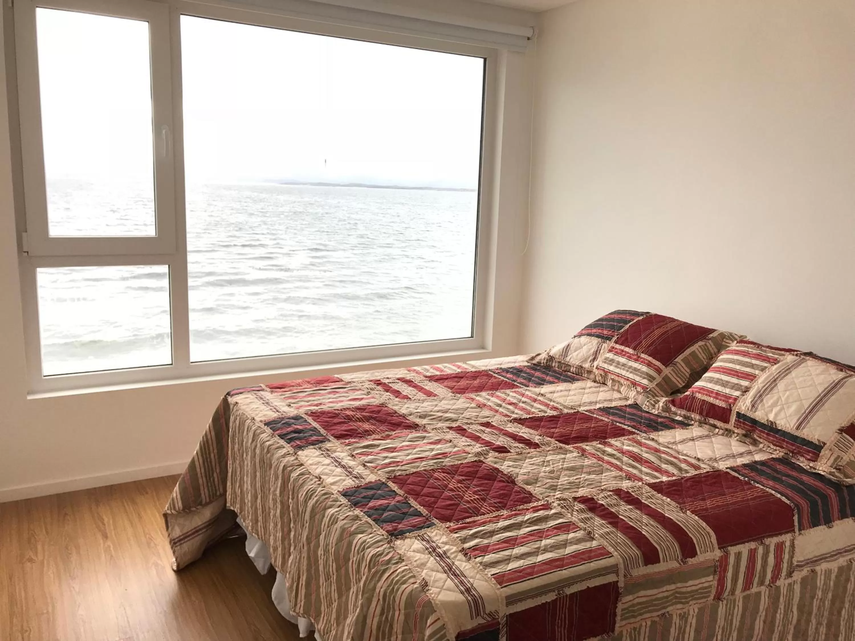 Bed in De la Costa Apartamentos