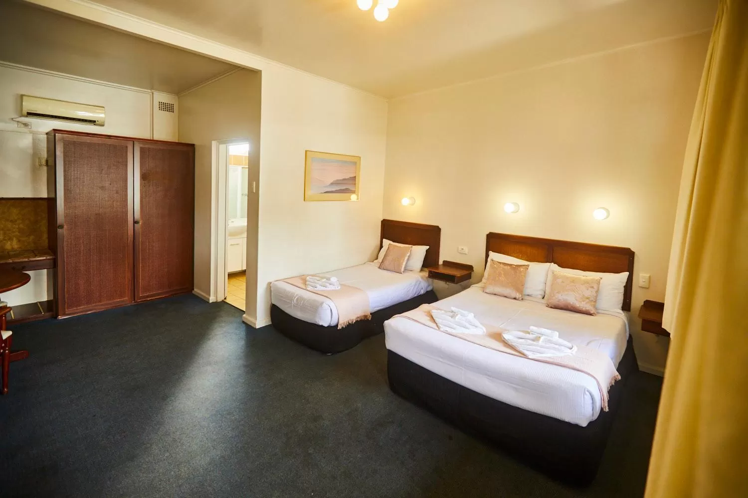 Bed in Town and Country Motel