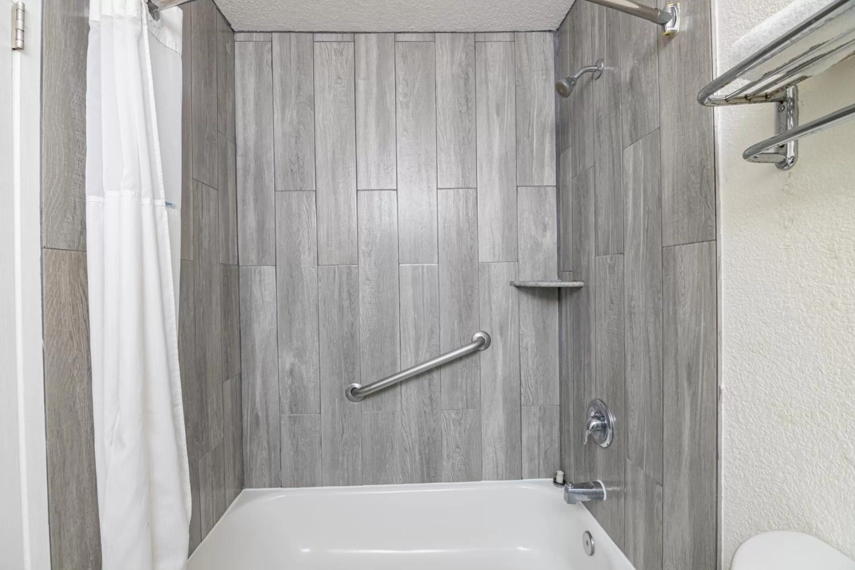 Shower in Hospitality Inn