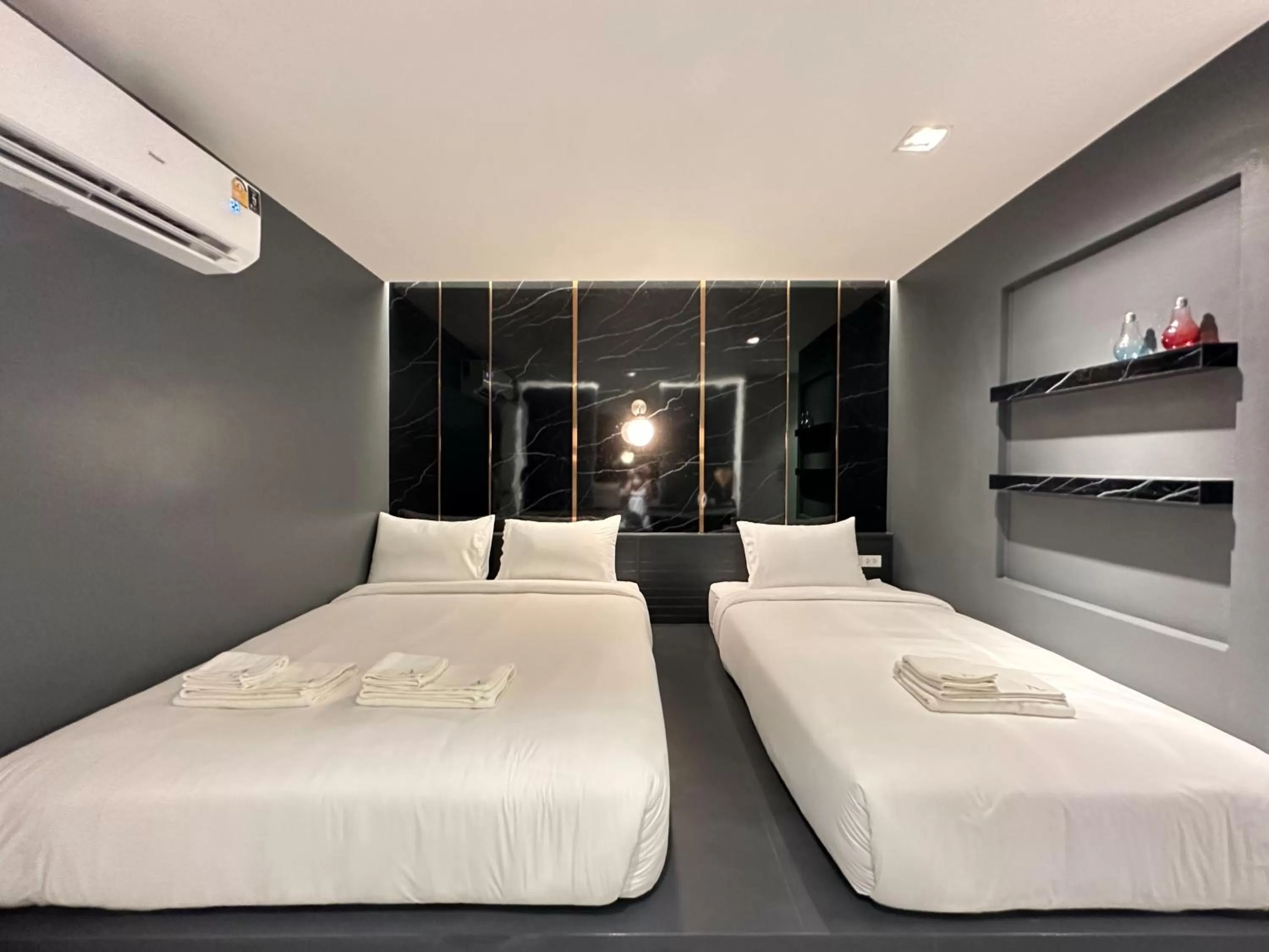 Bed in Ascella Bangkok Hotel