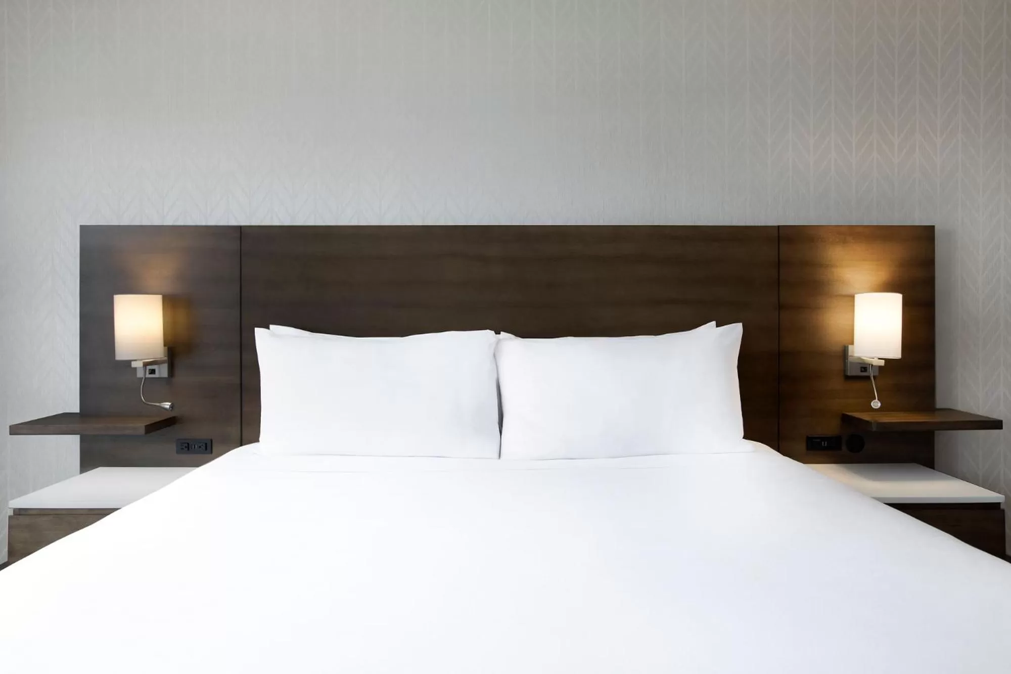 Bed in Great Blue Heron Hotel