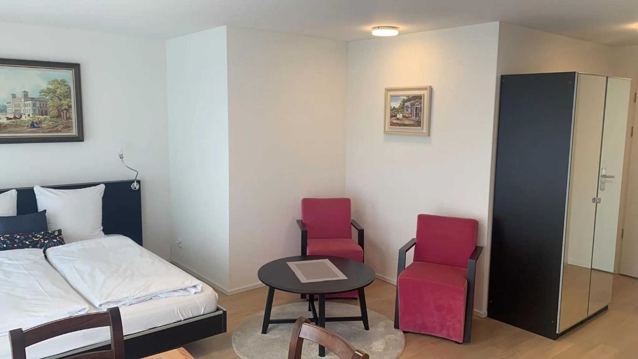 Photo of the whole room, Bed in Swiss Star Zurich Oerlikon - Self Check-In