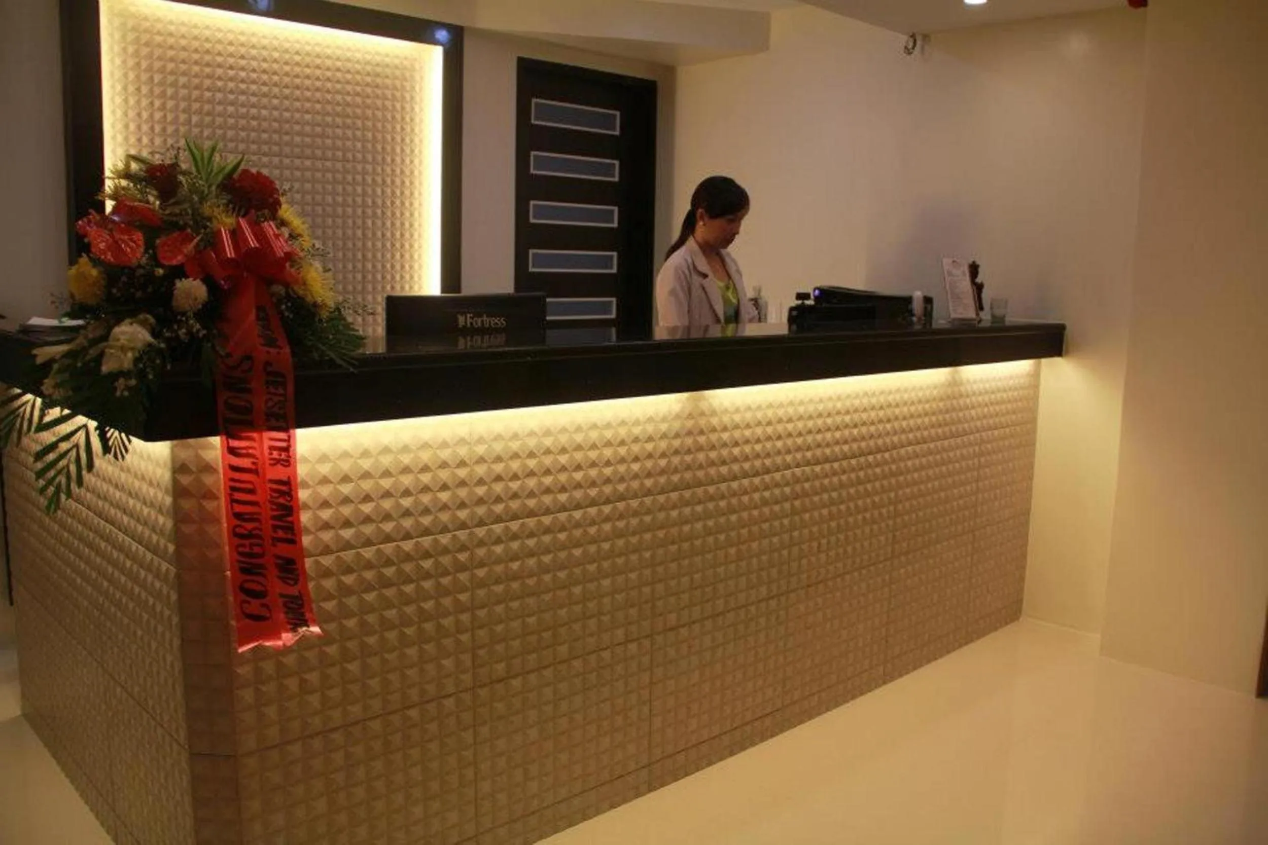 Staff in Manhattan Suites Inn