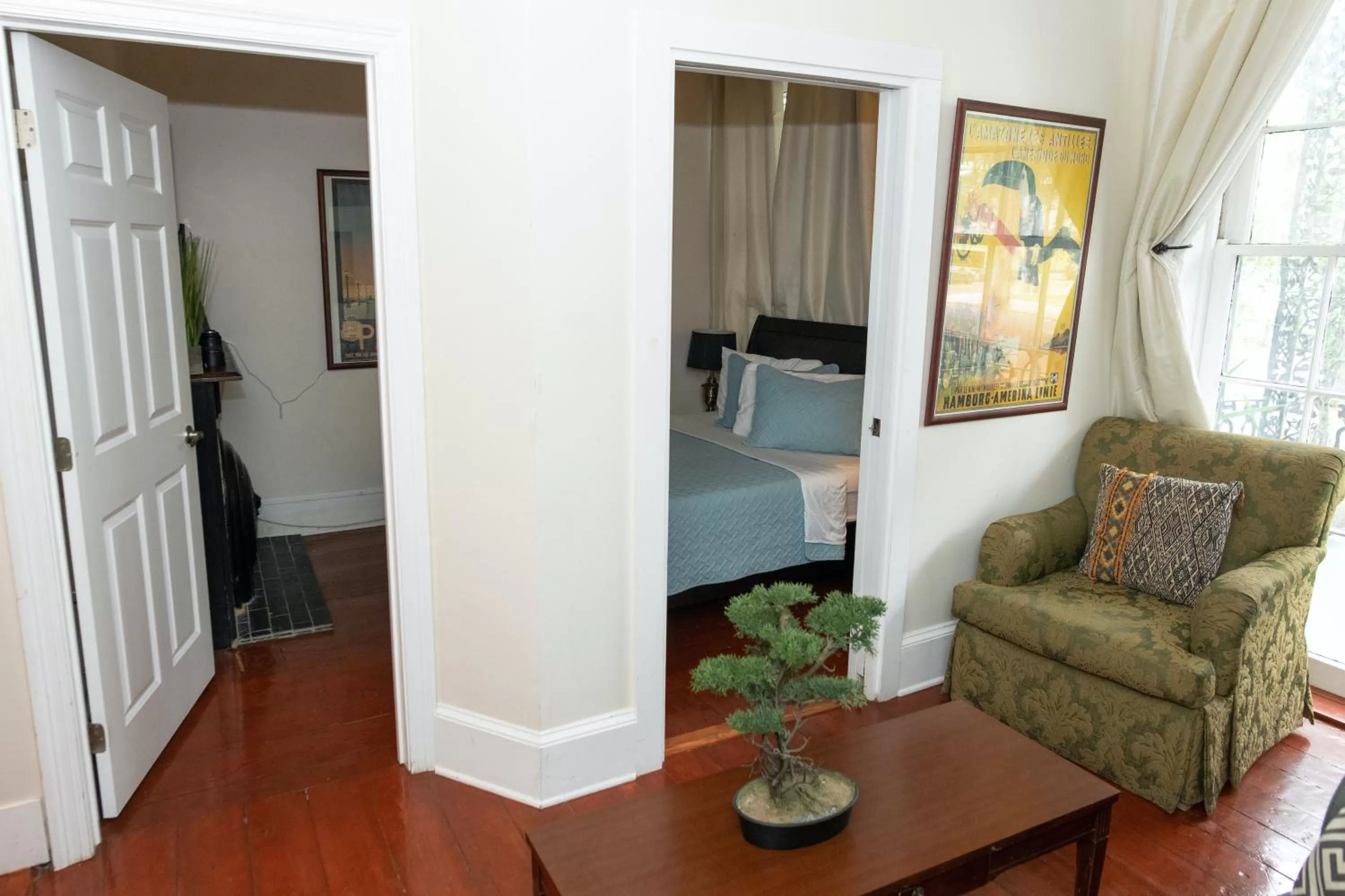 Bed in The Esplanade Guesthouse Mansion