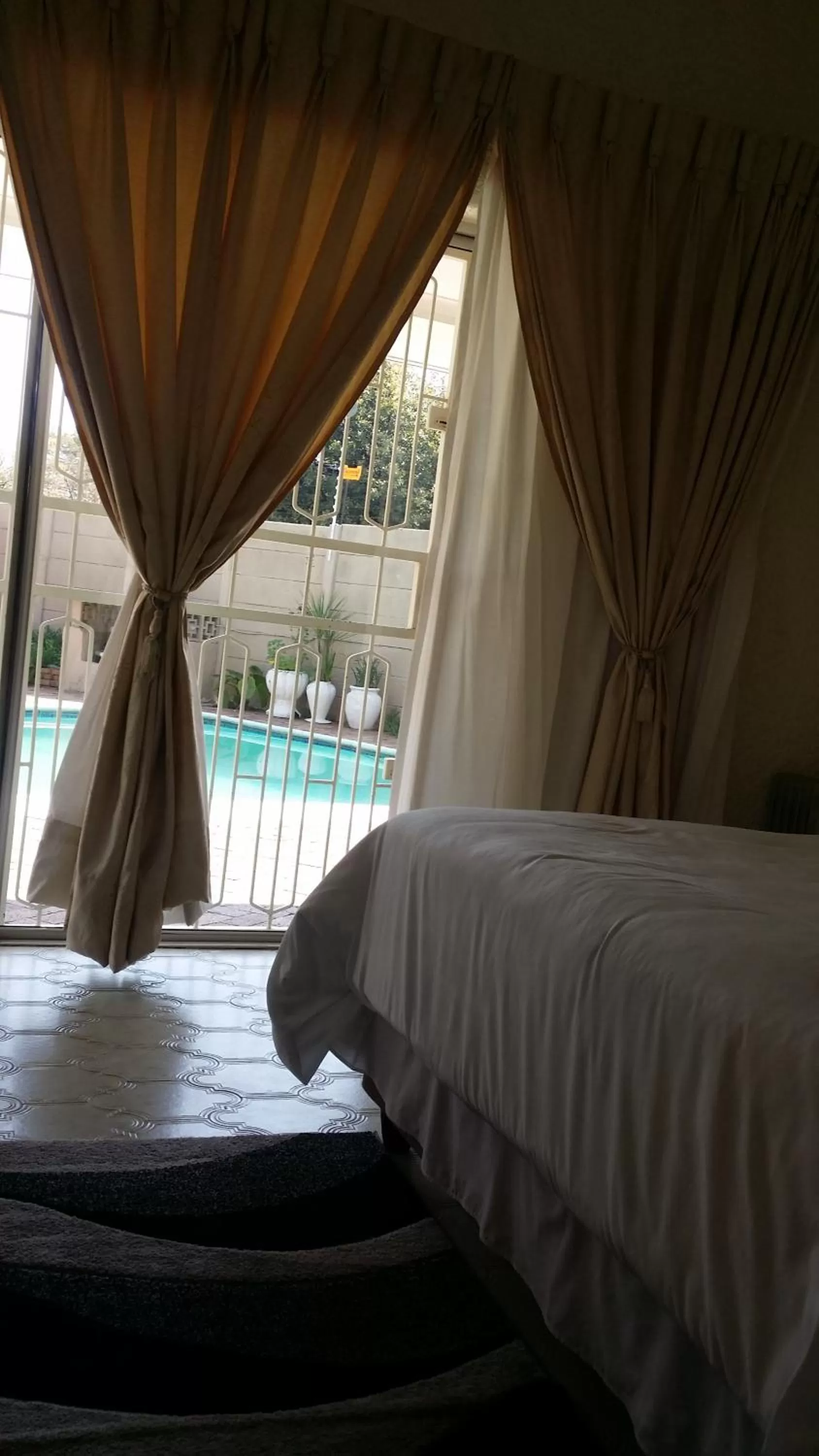 Swimming pool, Bed in Moye Guest House