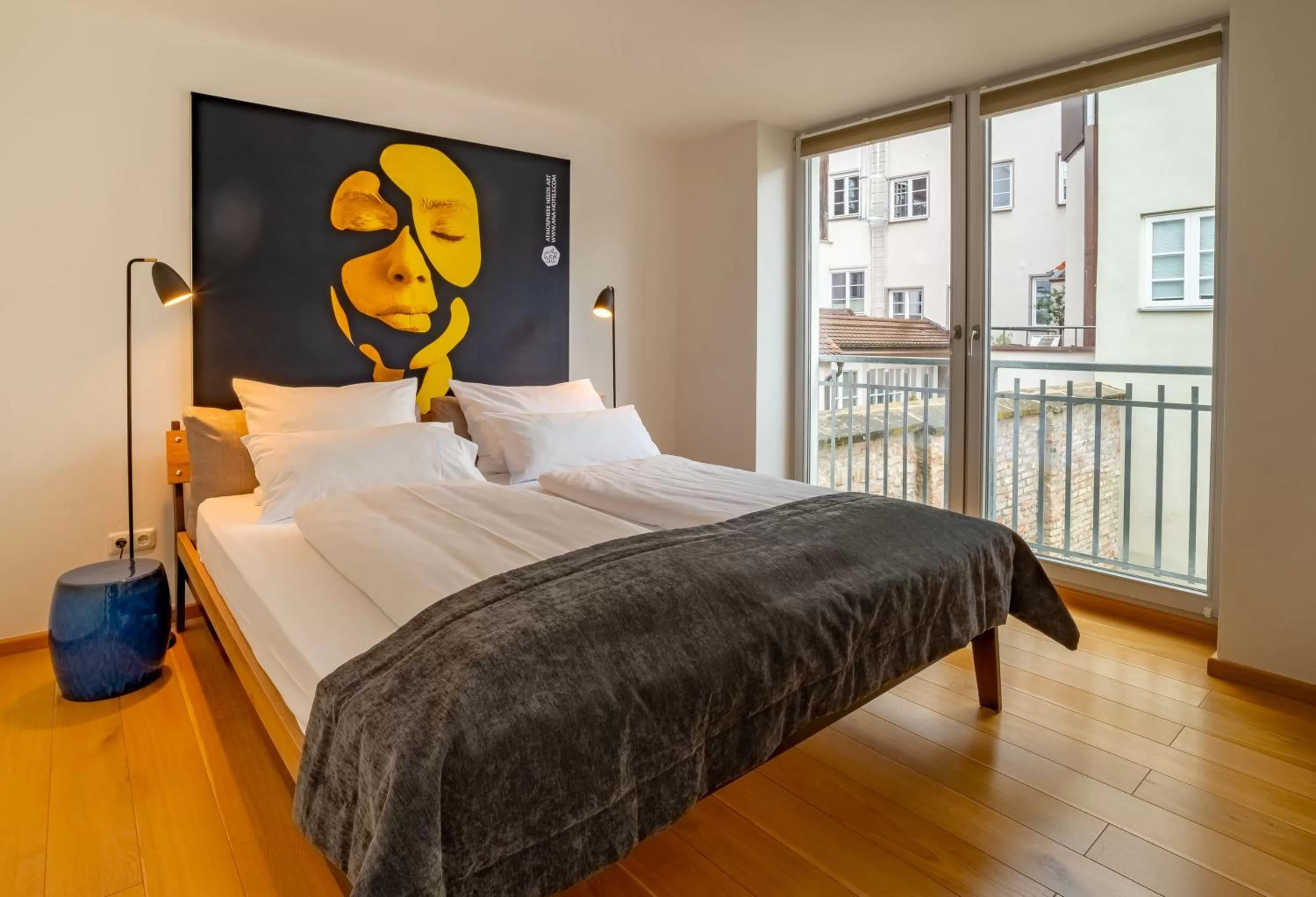 Bed in ANA Living Augsburg City Center by Arthotel ANA - Self-Service-Hotel