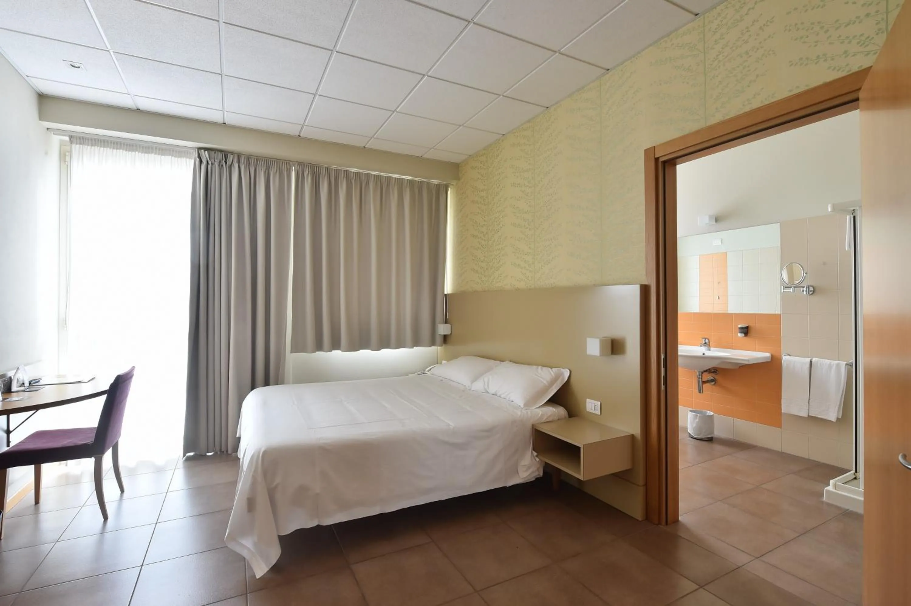 Bedroom, Bed in Tatì Hotel