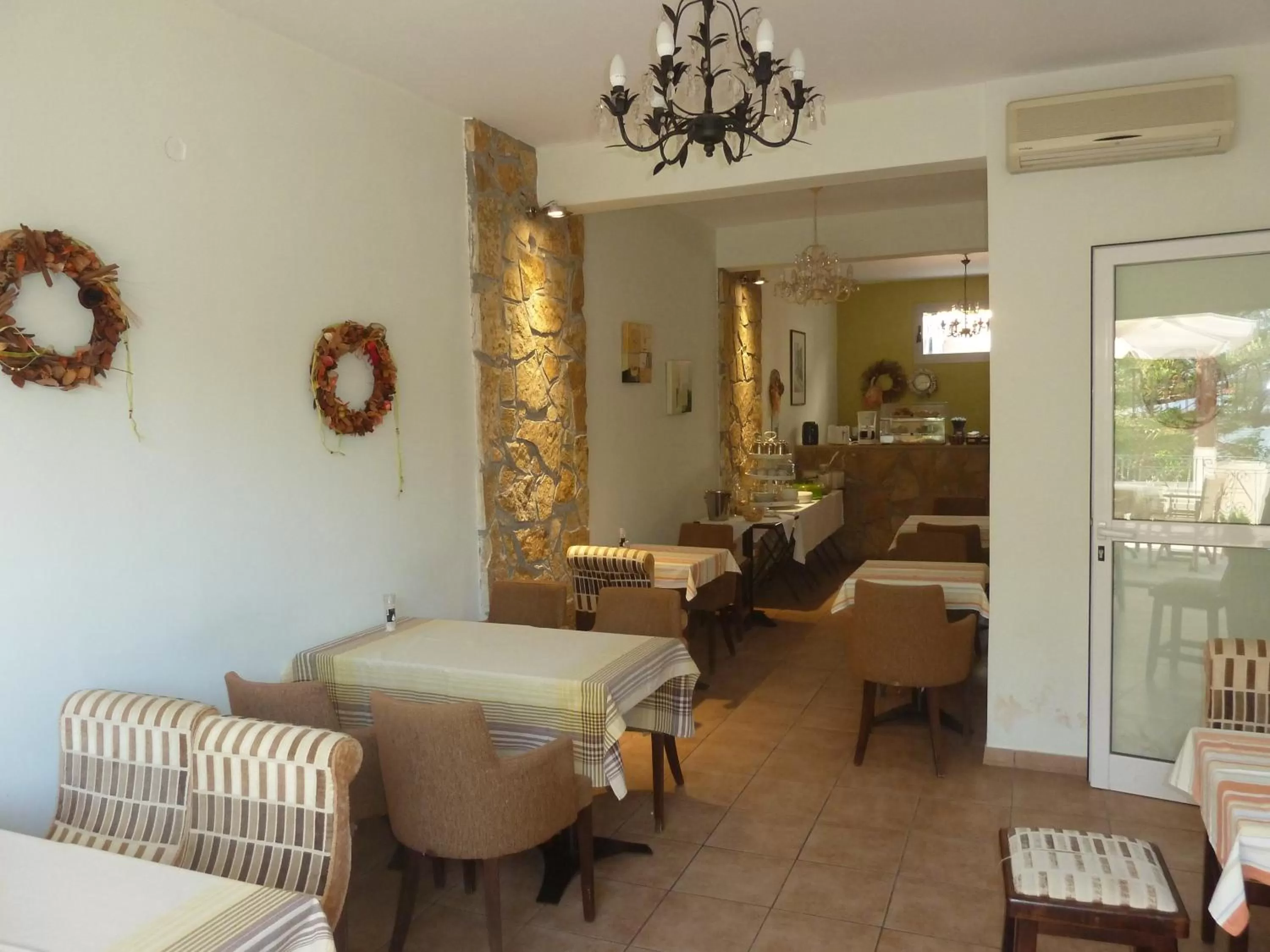 Communal lounge/ TV room in Zoe Pension