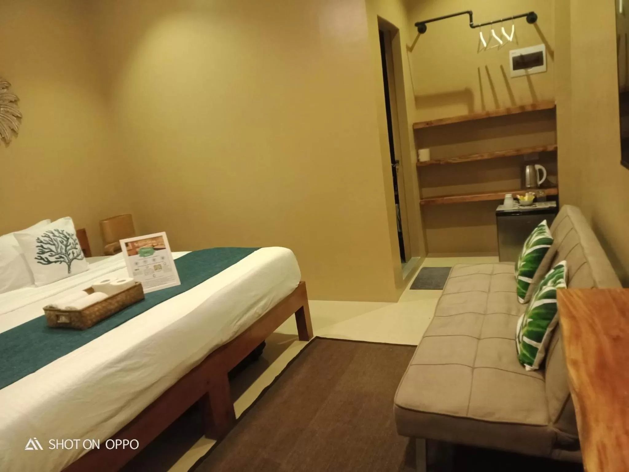 Bed in Southseas Beach Resort and Dive Center