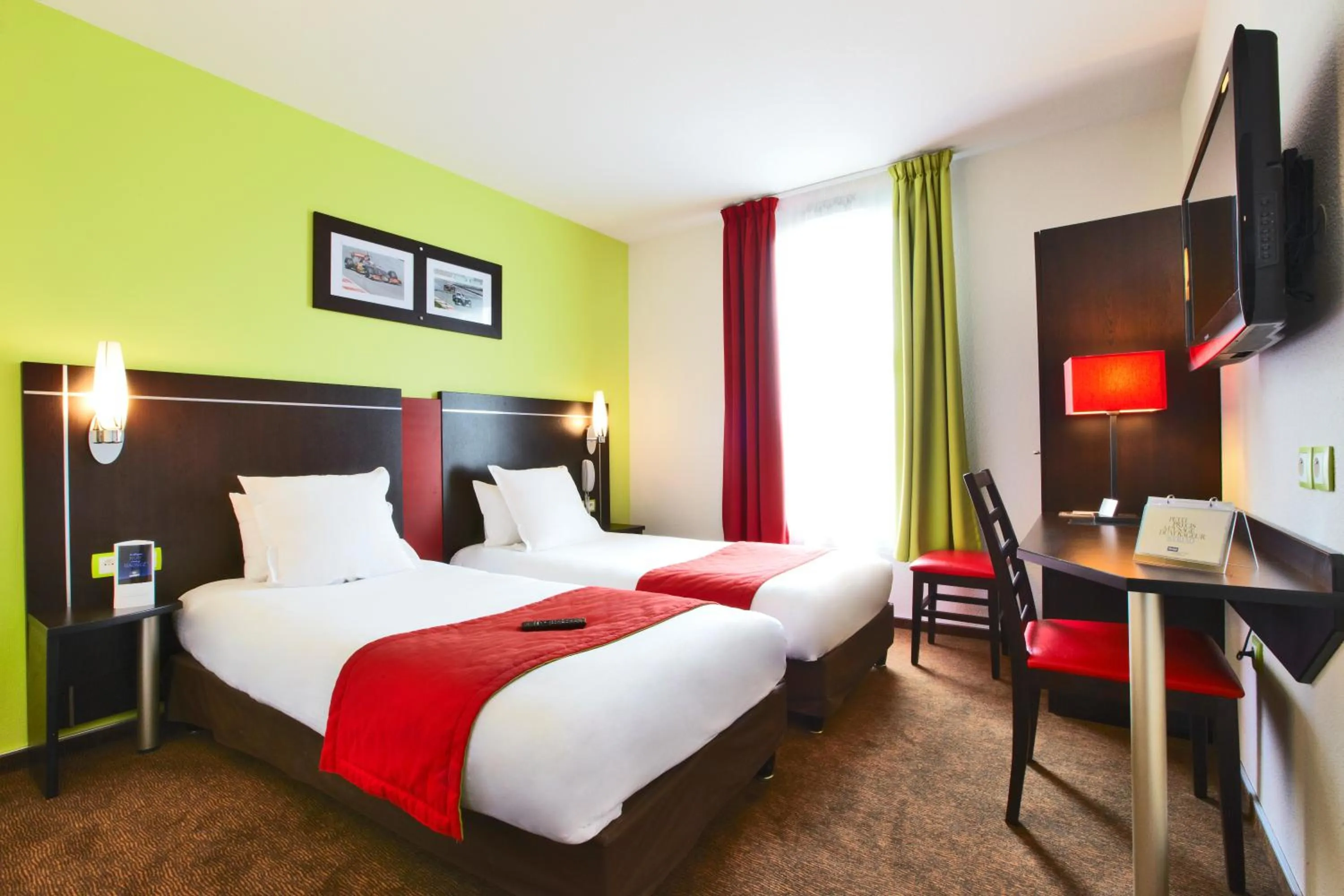 Photo of the whole room, Bed in Enzo Hotels Thionville by Kyriad Direct