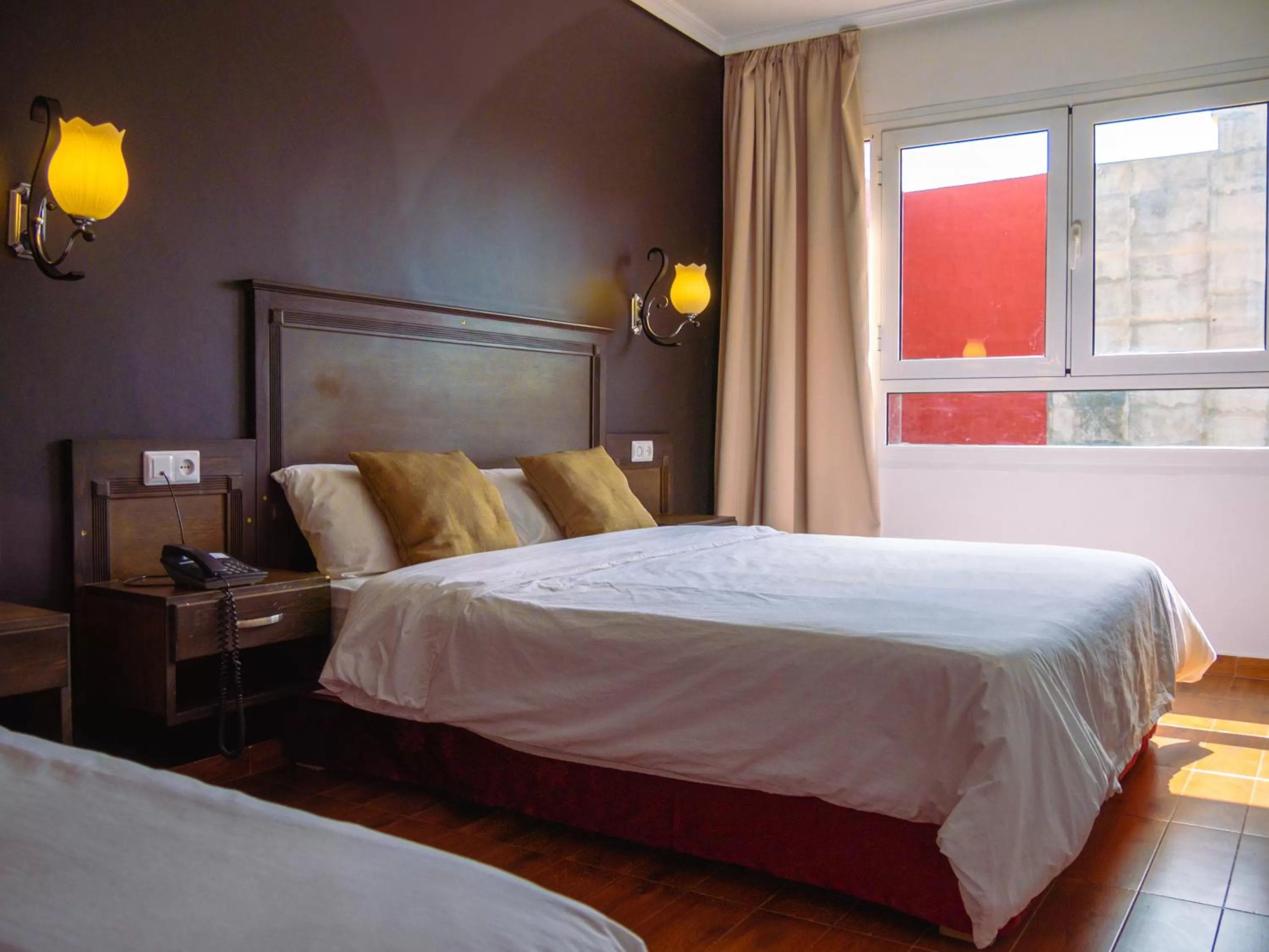 Bed in Hotel L'Aéroport