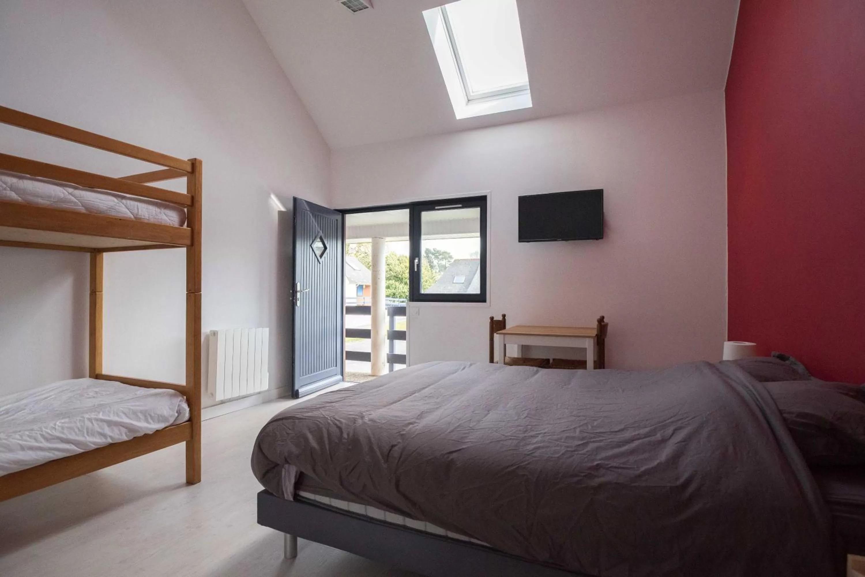 Bed in Les chambres du Bistro du Canal