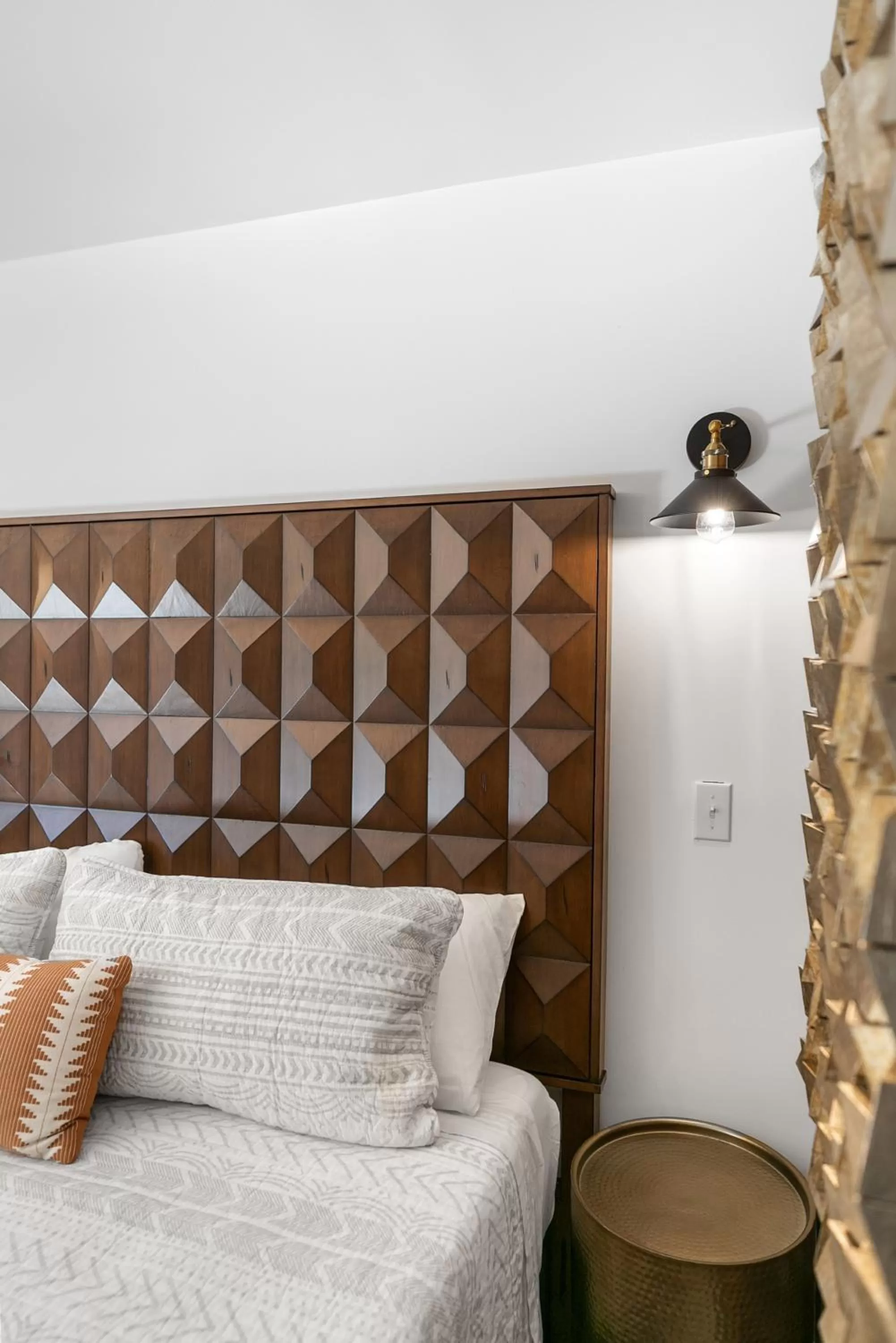 Bed in Candlewick Inn and Suites