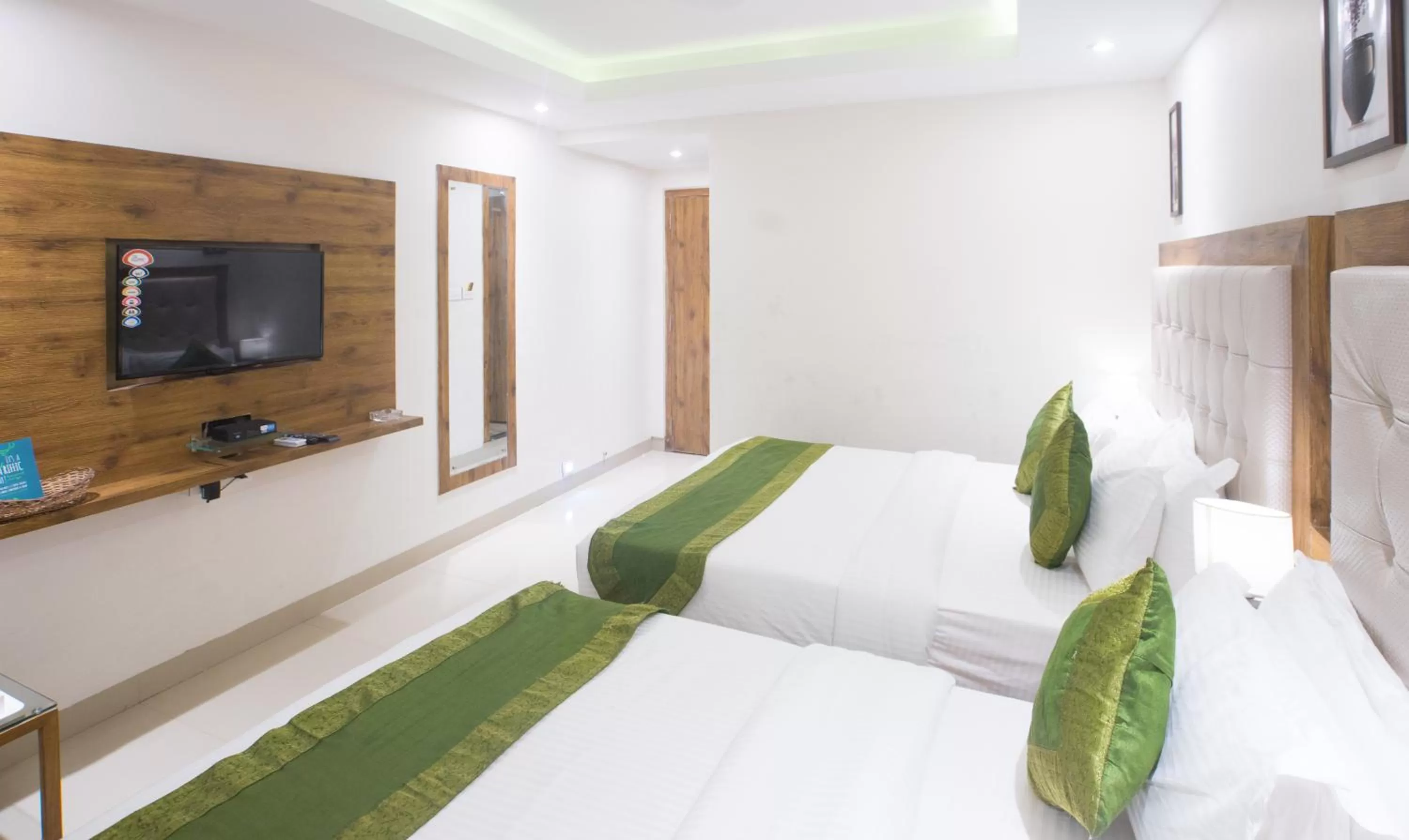 Bed in Treebo Amber International