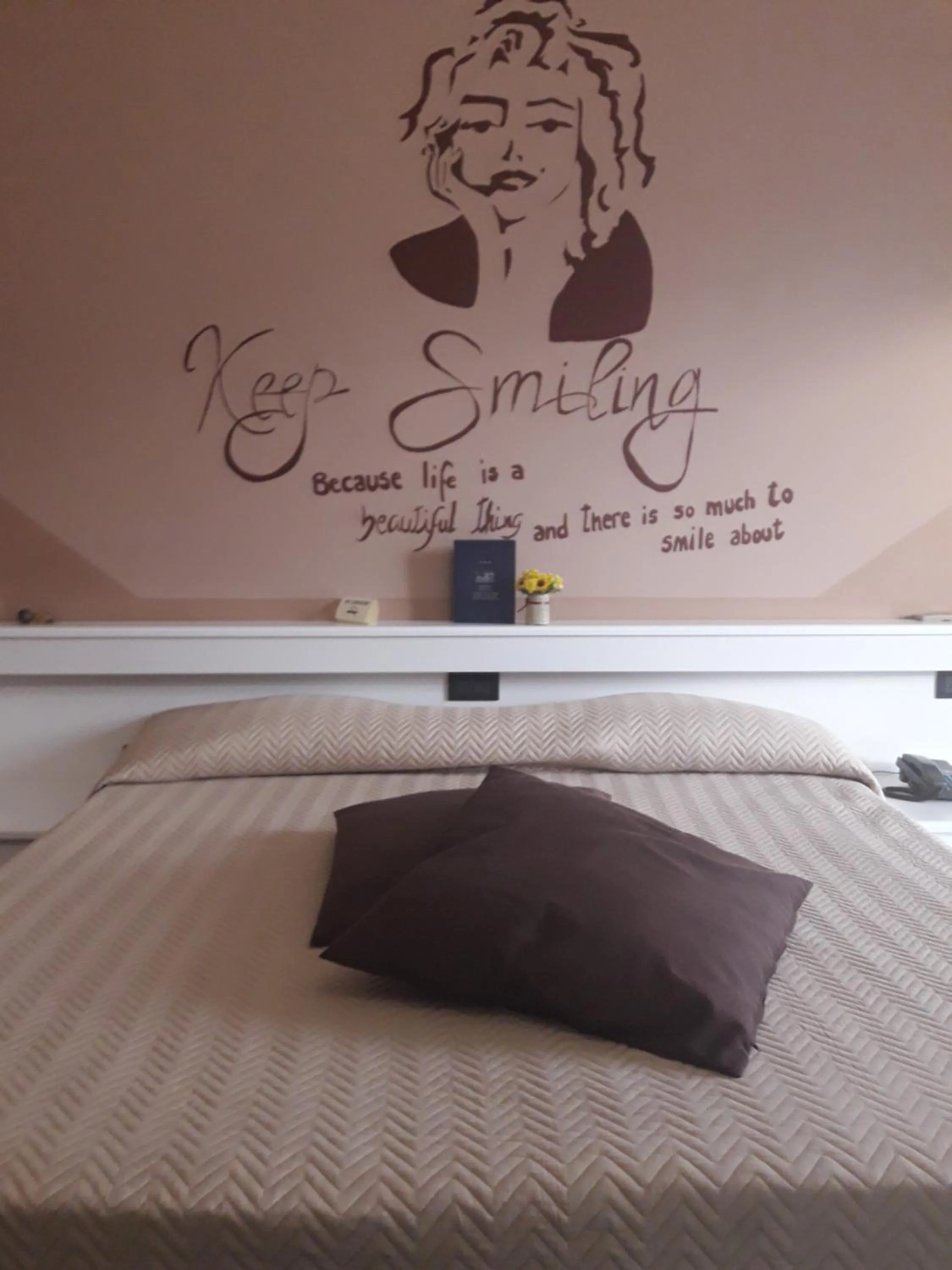 Bed in Hotel Stazione sul lago di Iseo