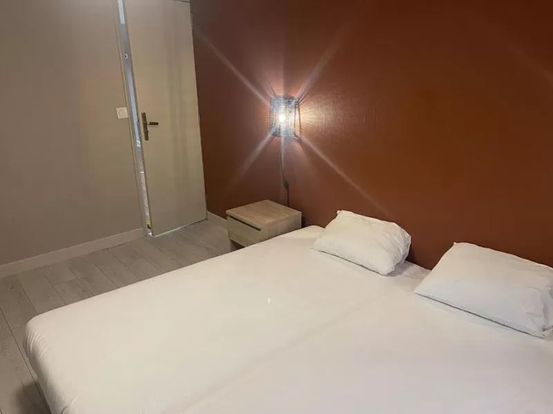 Bed in Hotel de la Gare