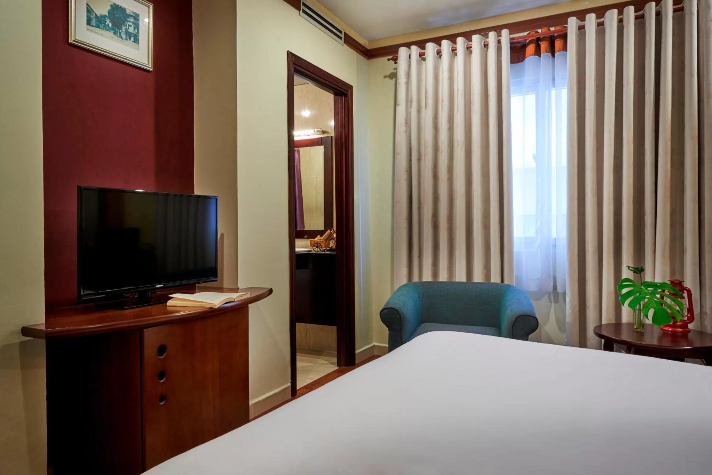 Bedroom, TV/Entertainment Center in Prostyle Hotel Ho Chi Minh プロスタイルホテルホーチミン