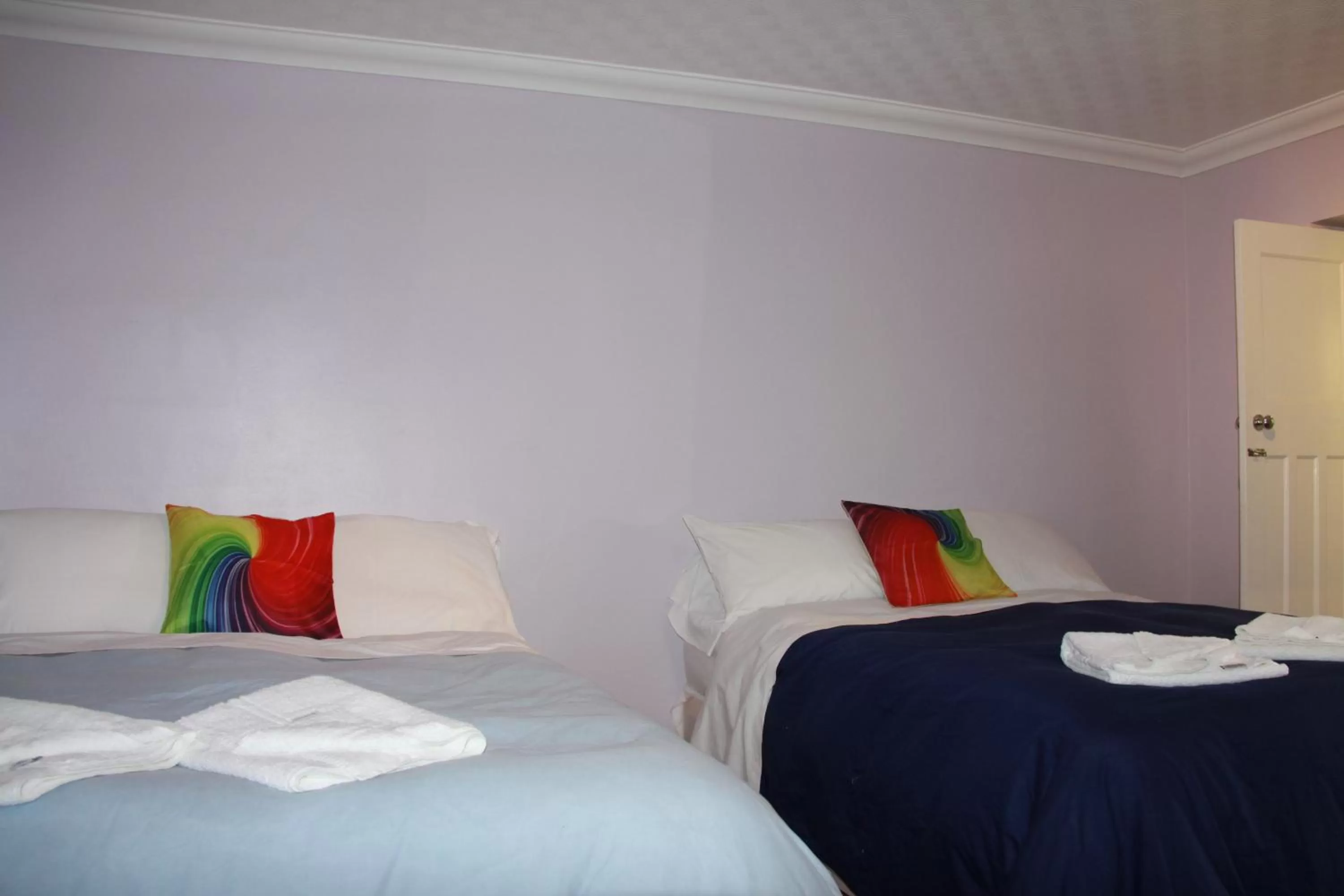 Bed in Ambassador Hotel