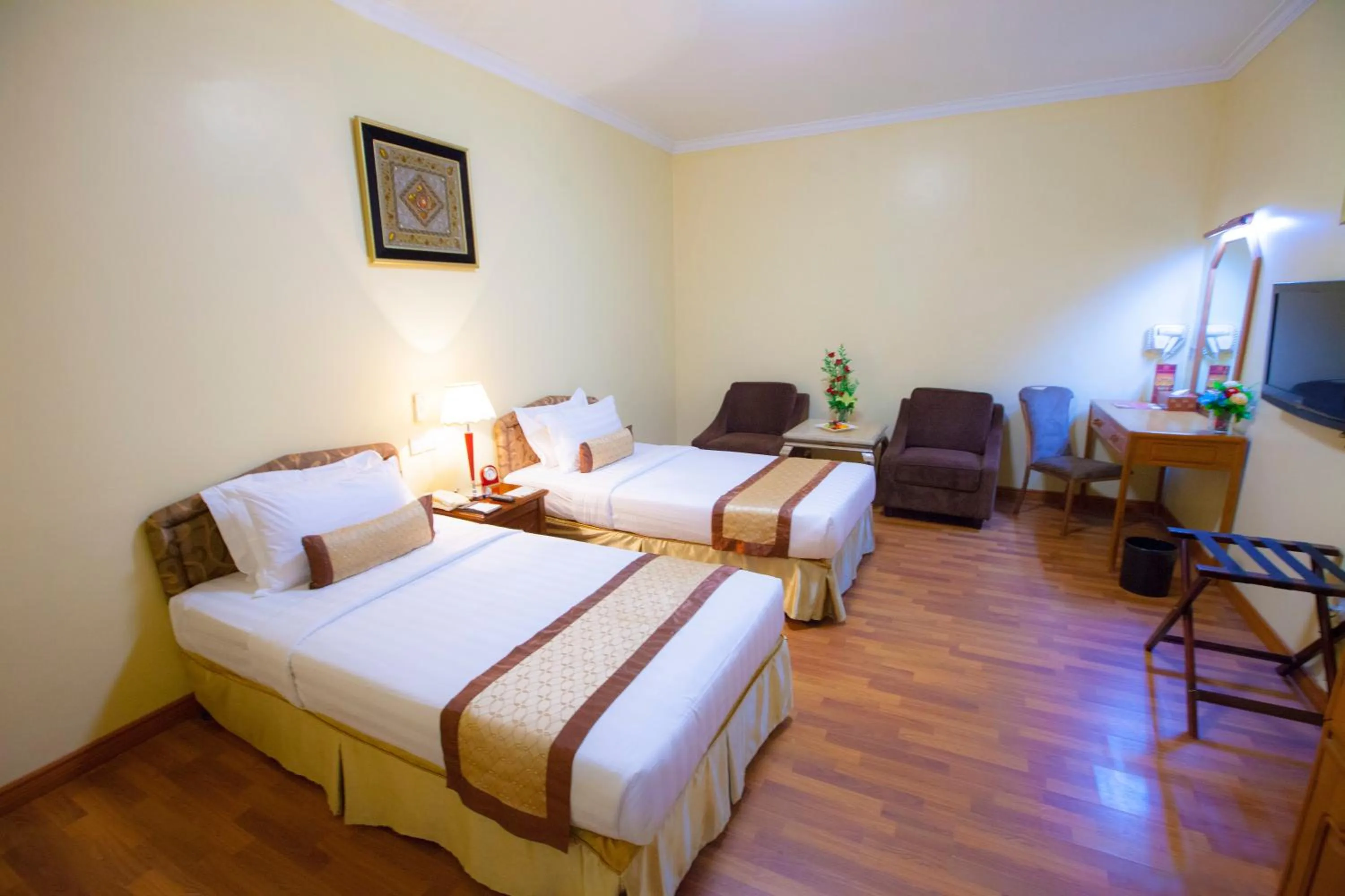 Bed in Grand Palace Hotel