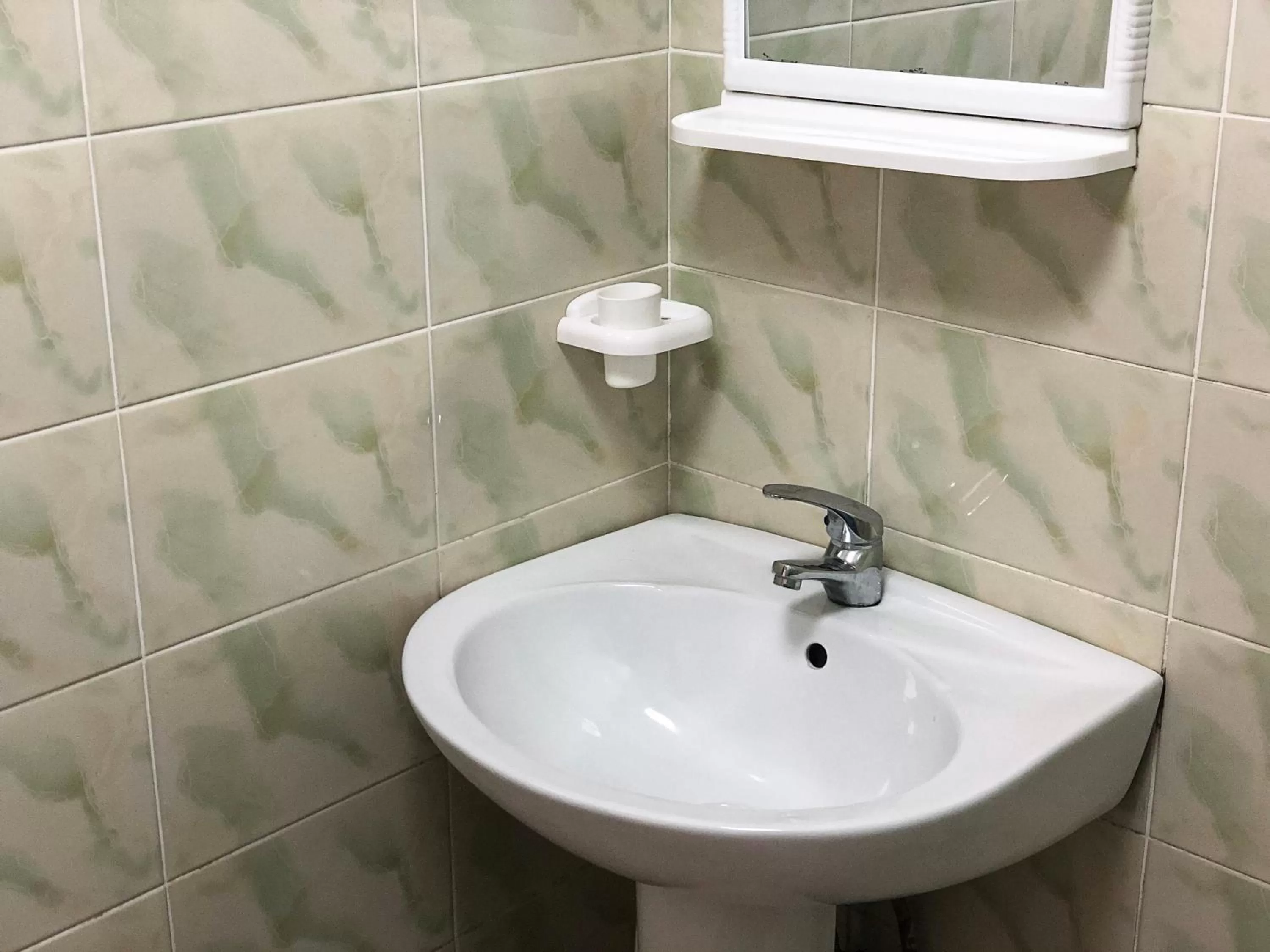 Bathroom in Zolotoy Bereg Hotel