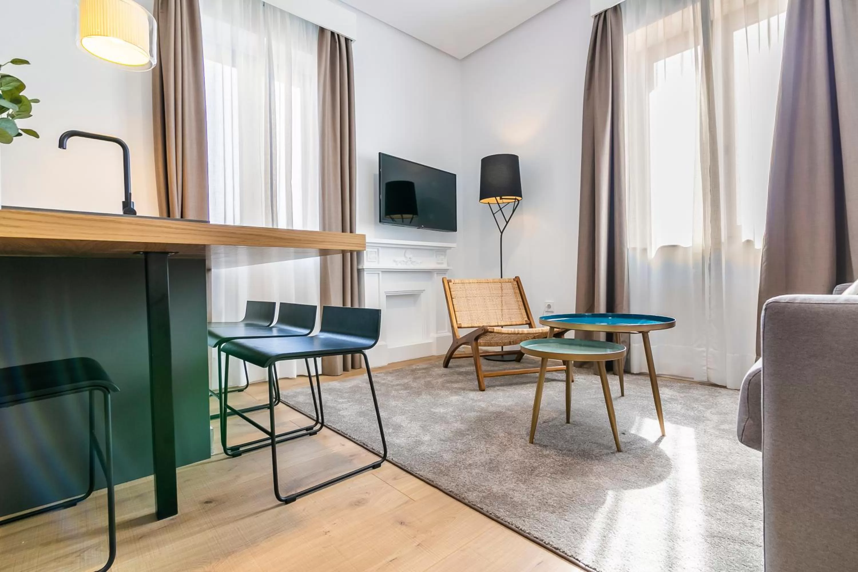 Communal lounge/ TV room in Aquitania Home Suites