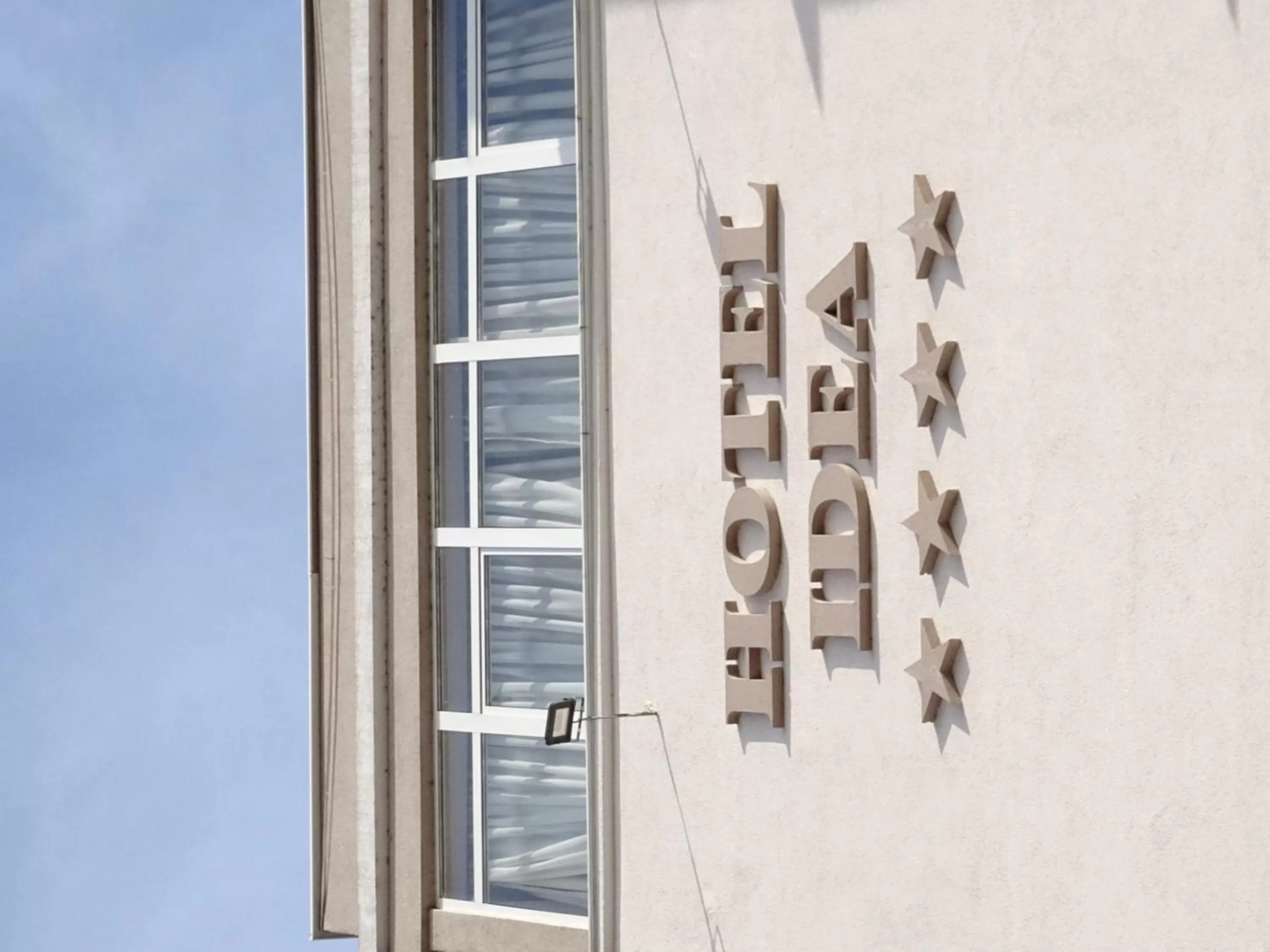 Property logo or sign in Signature Idea hotel