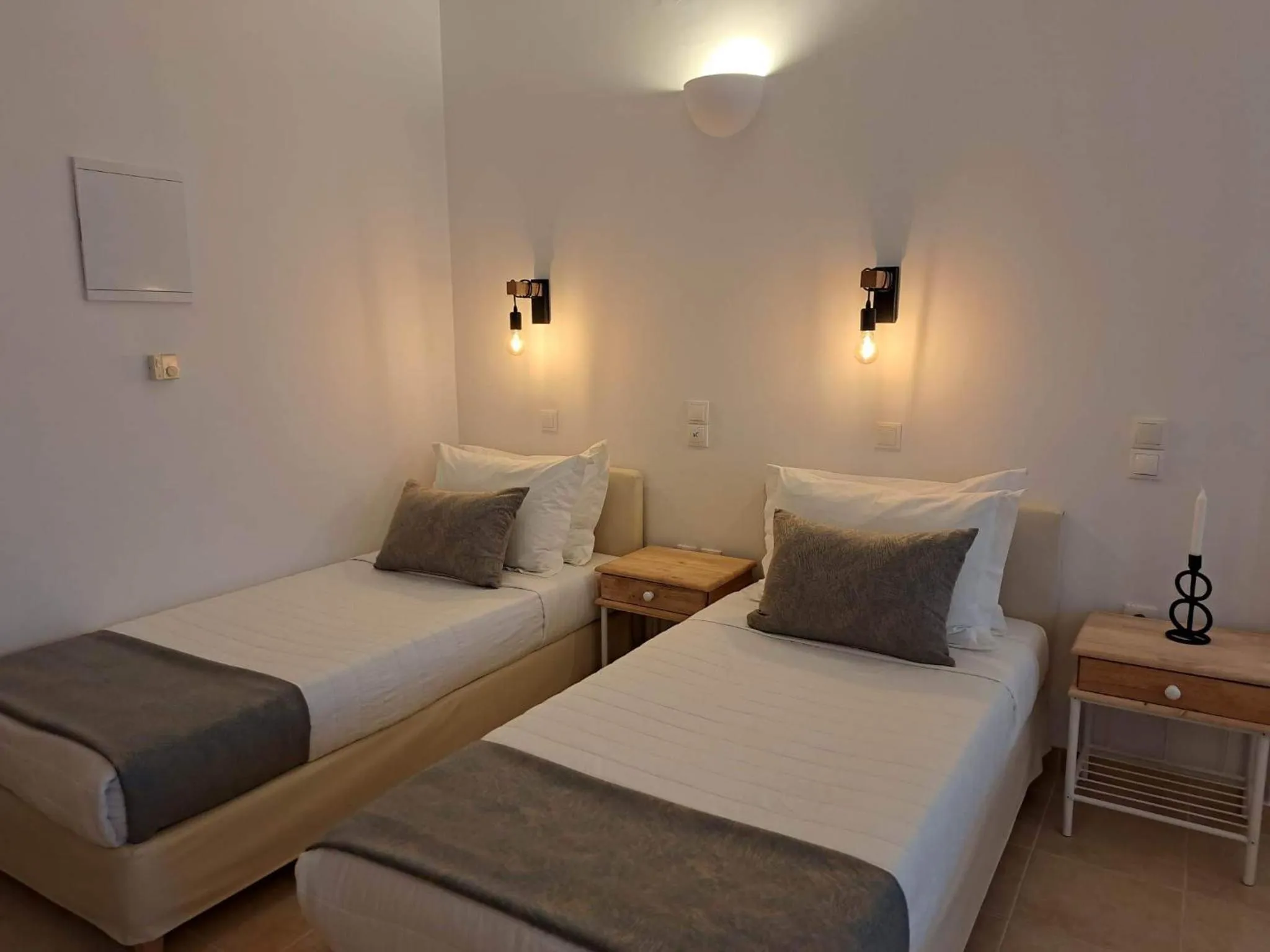 Bed in Amerisa Suites & Villa