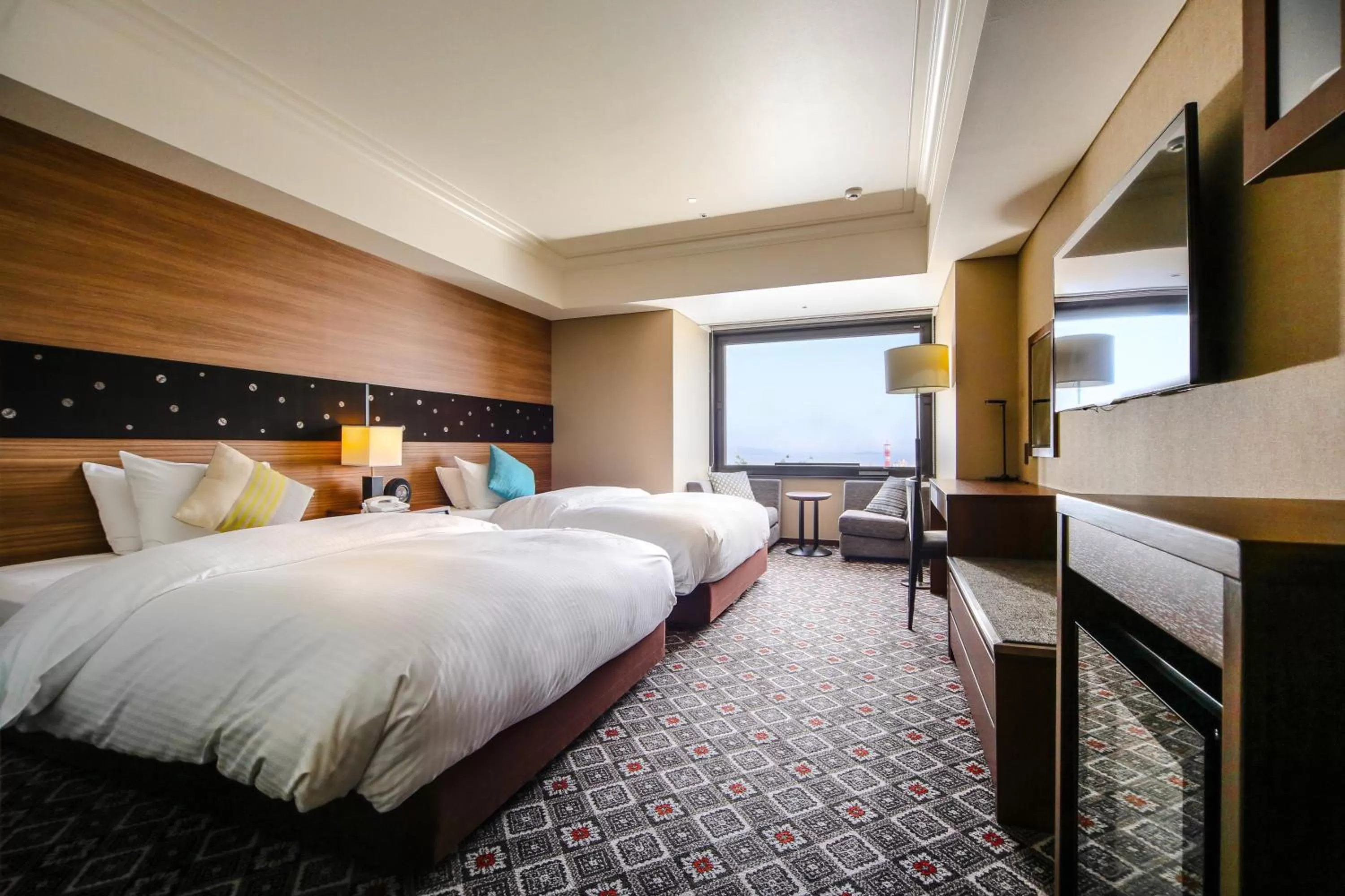 Bed in SHIROYAMA HOTEL kagoshima