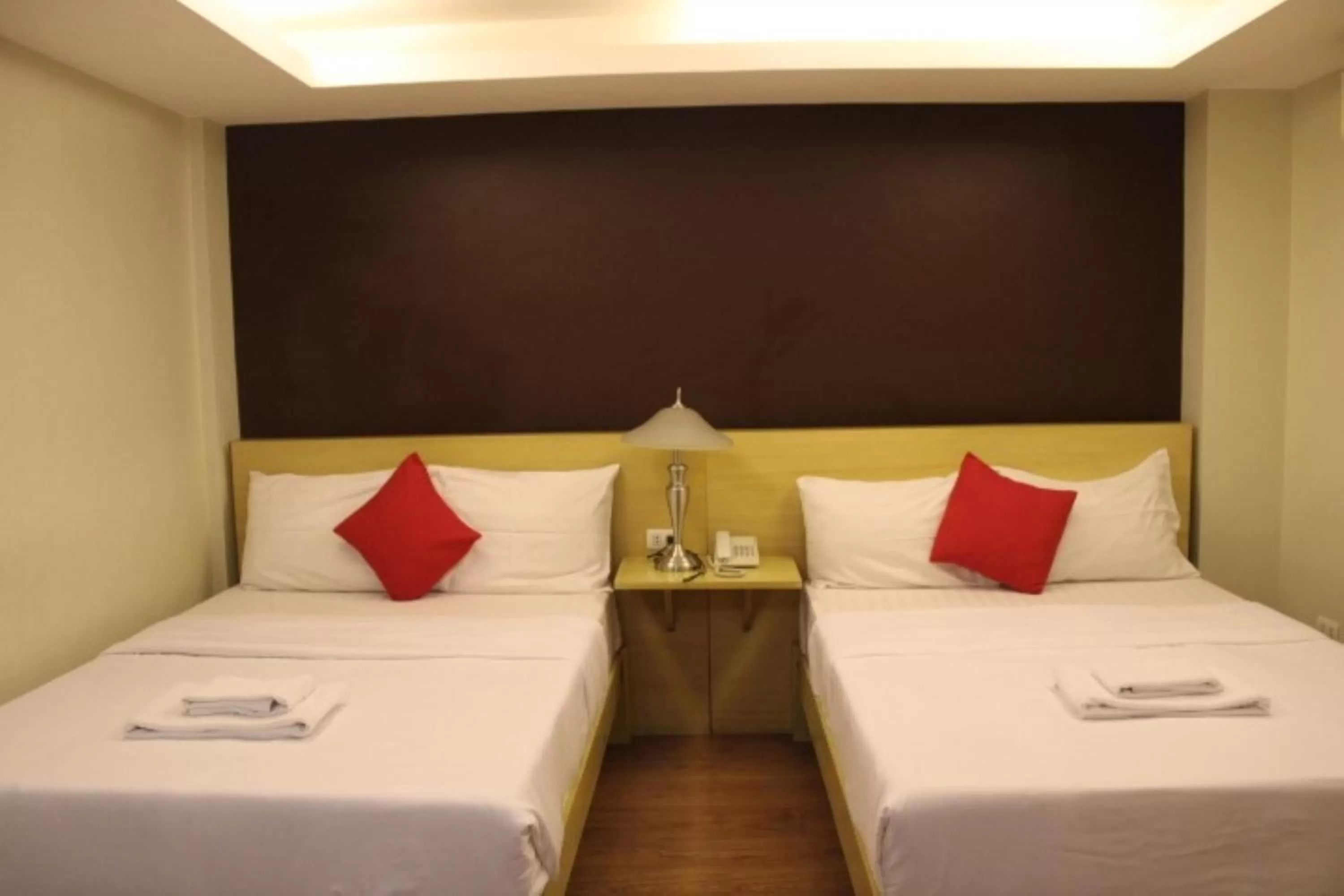 Bed in Festive Hotel Makati