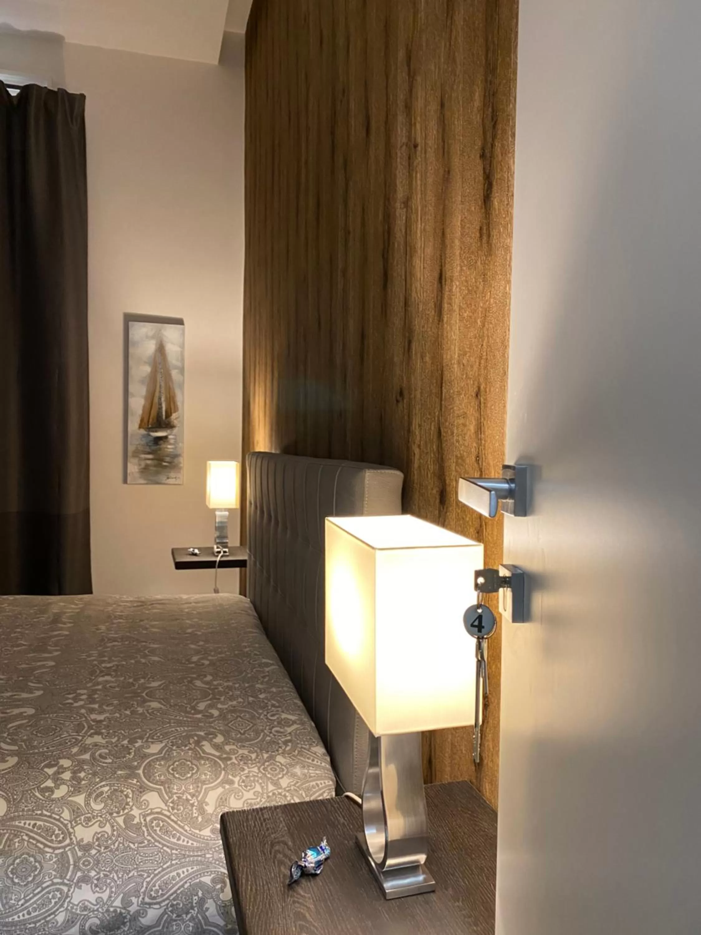 Bed, TV/Entertainment Center in Mamì B&B