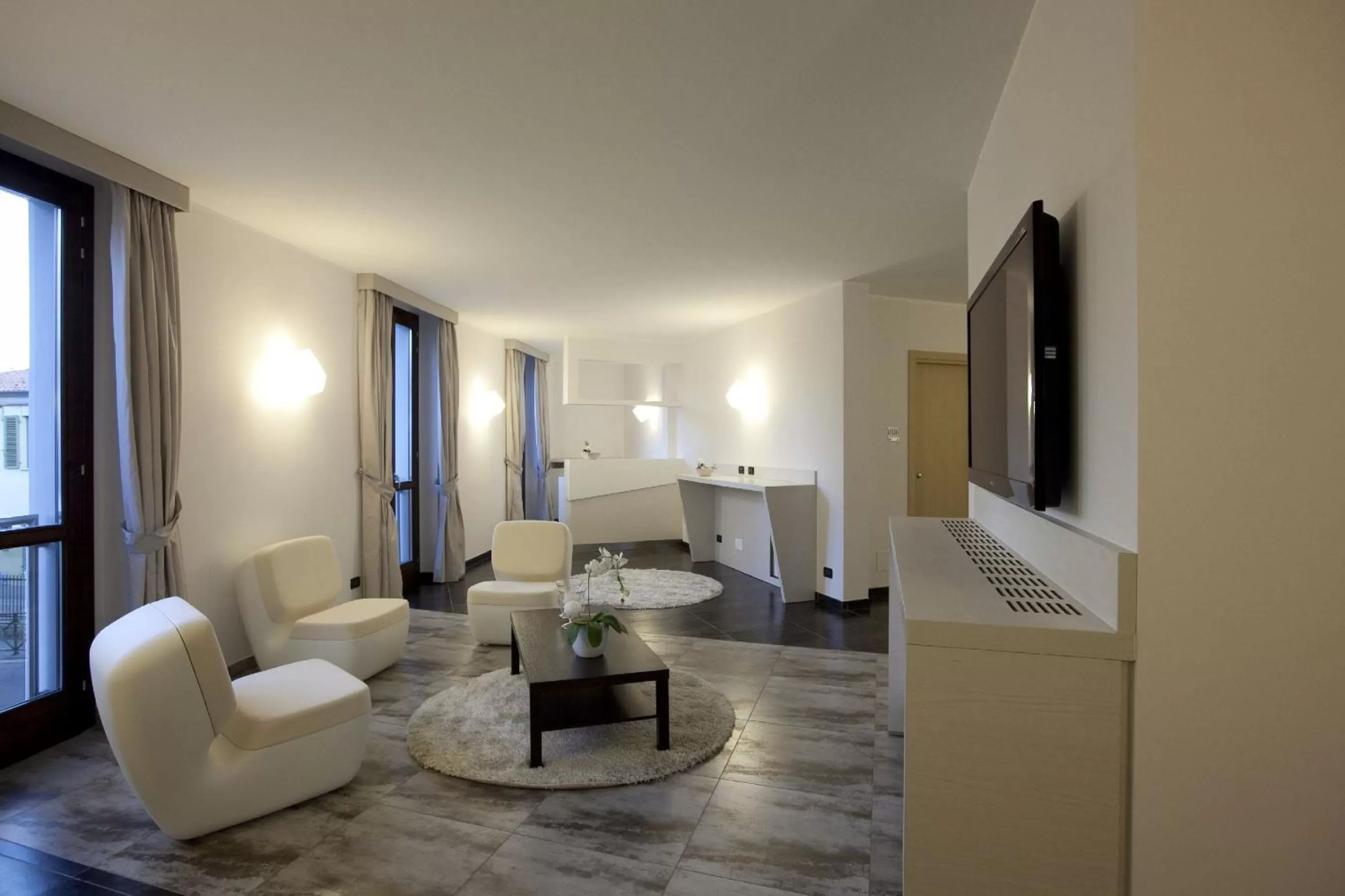 Communal lounge/ TV room, Seating Area in Hotel La Meridiana