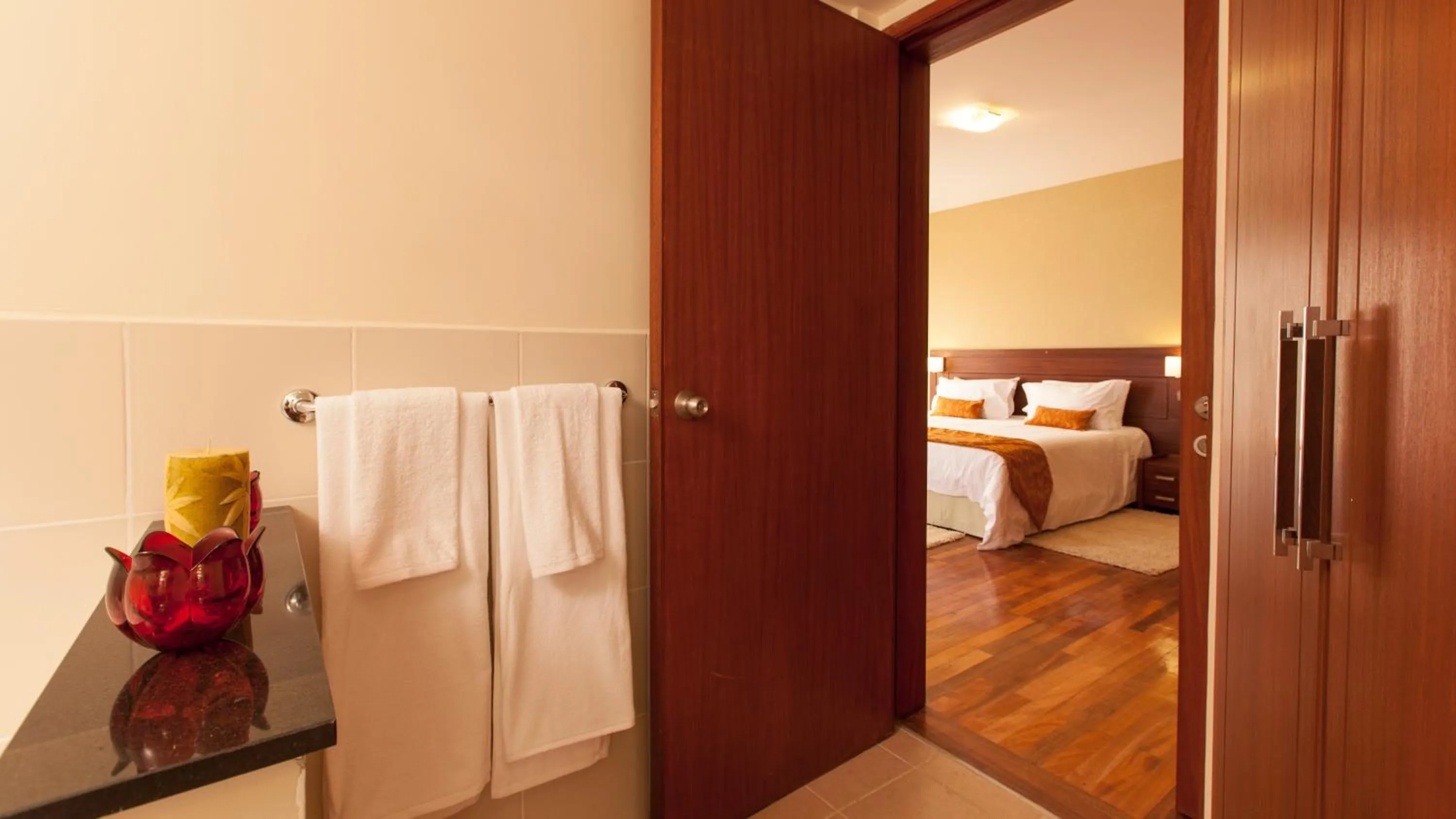 Bathroom, Bed in Waridi Paradise Hotel and Suites