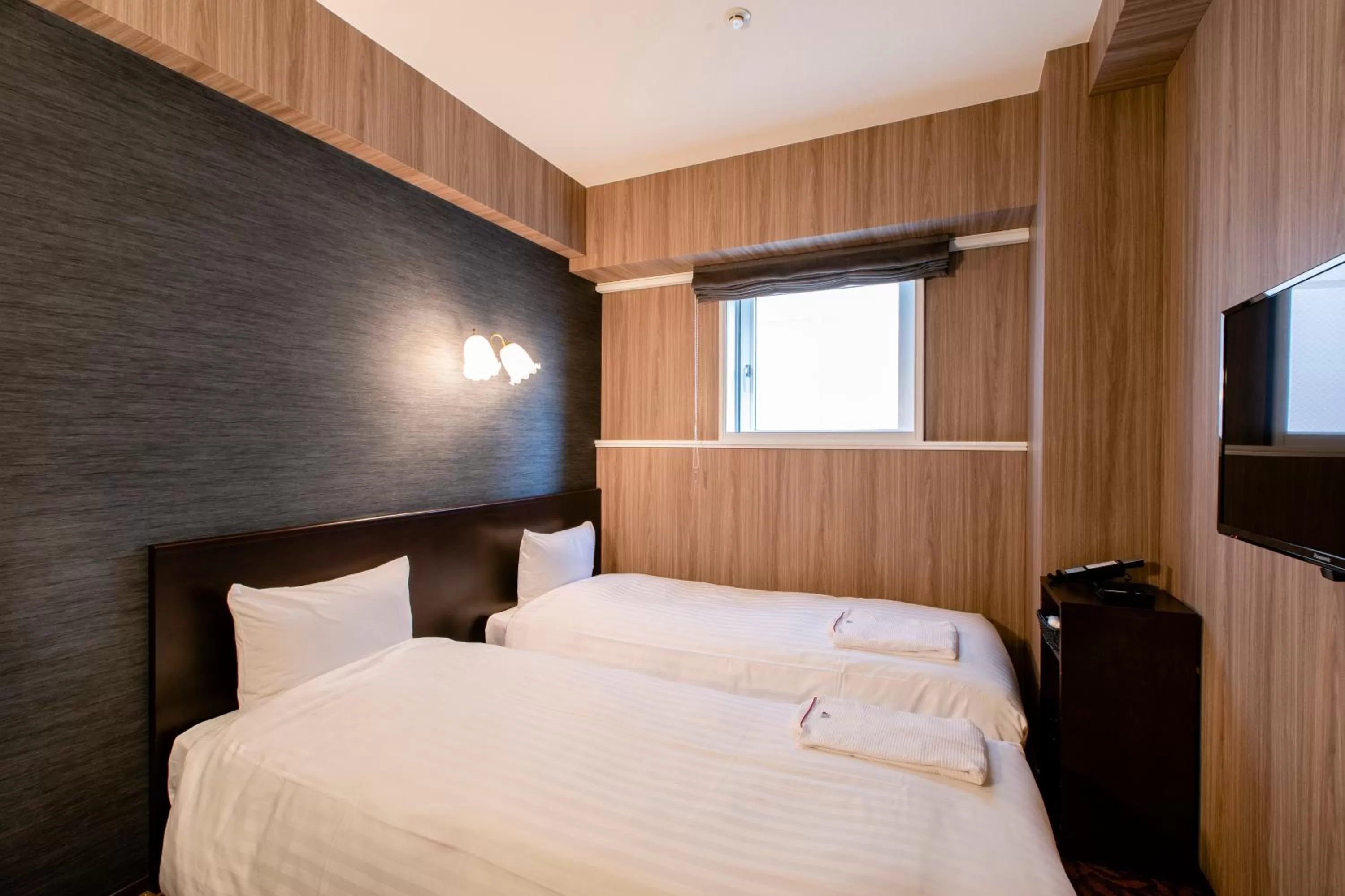 Photo of the whole room, Bed in Hotel Wing International Asahikawa Ekimae