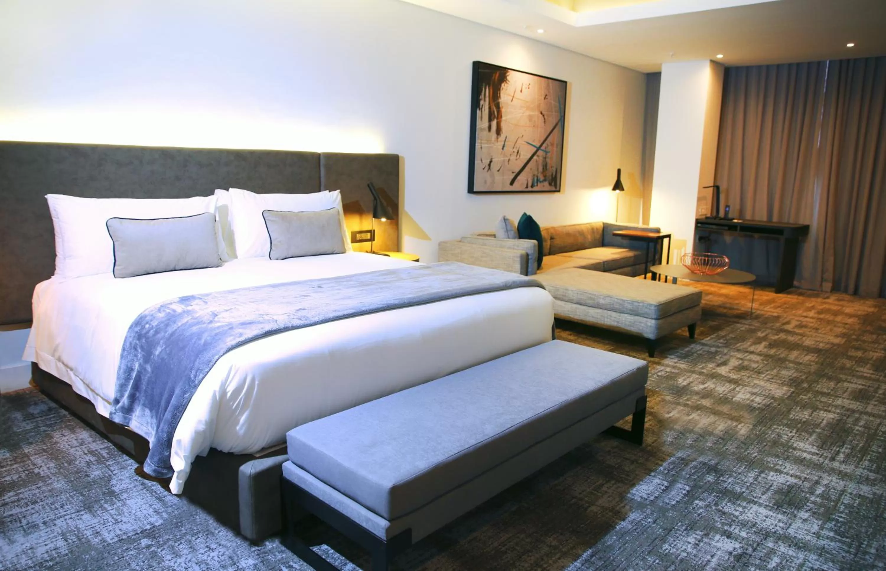 Seating area, Bed in The Capital Mirage