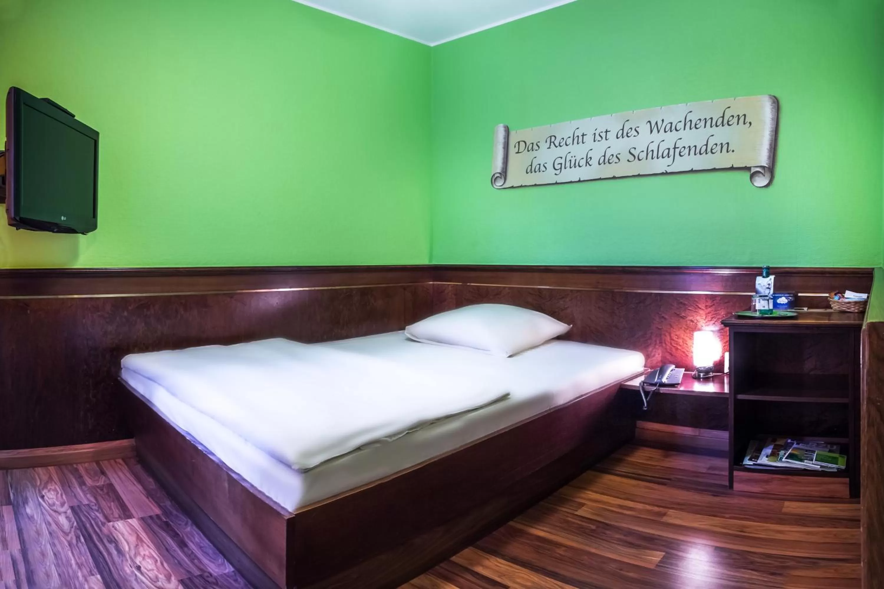 Photo of the whole room, Bed in Hotel am Wilhelmsplatz