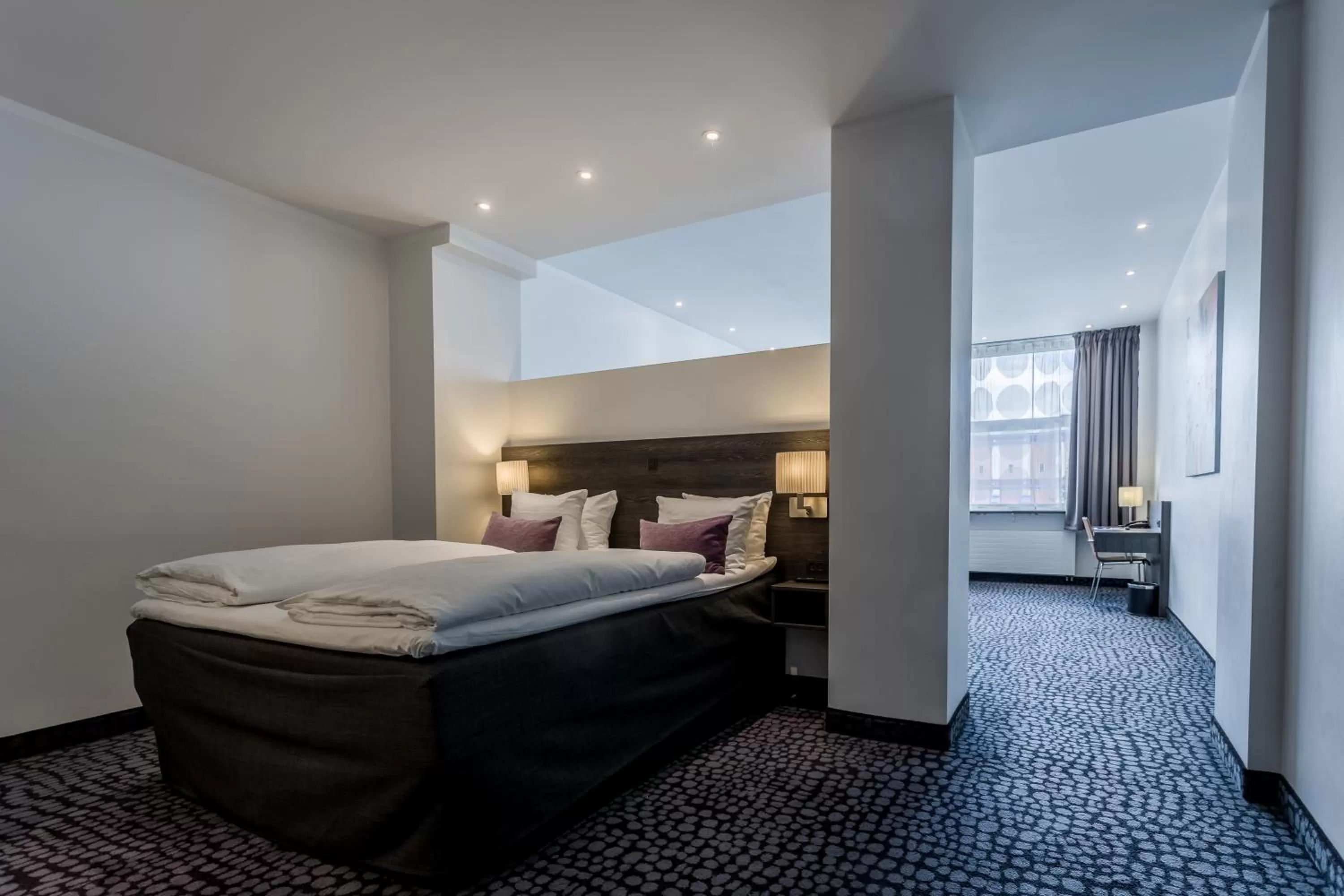 Bed in ProfilHotels Mercur